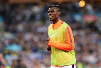 SYDNEY, AUSTRALIA - AUGUST 10:  Paul Pogba of Juventus warms up prior to the match between the A-League All Stars and Juventus at ANZ Stadium on August 10, 2014 in Sydney, Australia.  (Photo by Joosep Martinson/Getty Images)