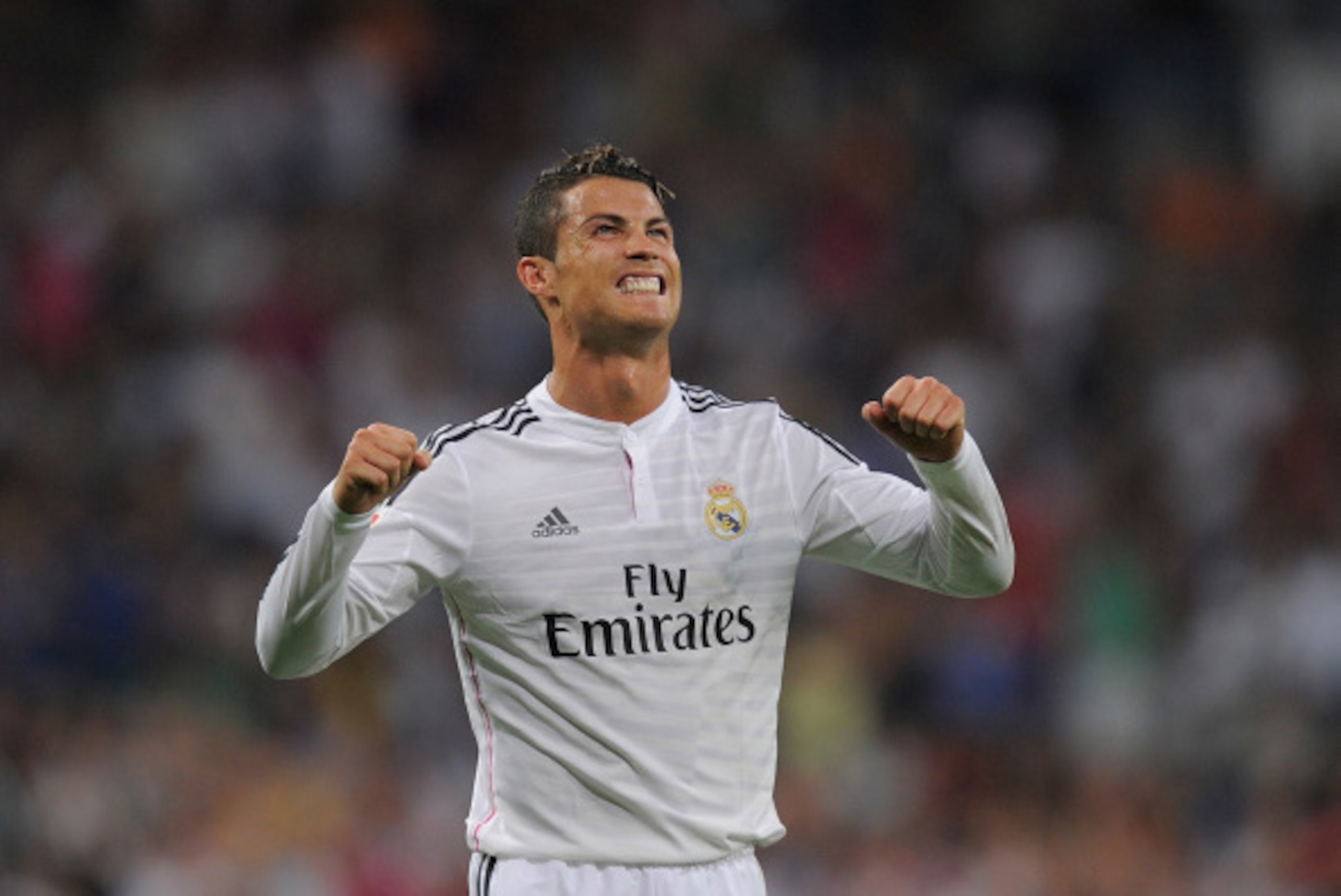 MADRID, SPAIN - AUGUST 25:  Cristiano Ronaldo of Real Madrid celebrates after scoring Real's 2nd goal during the La liga match between Real Madrid CF and Cordoba CF at Estadio Santiago Bernabeu on August 25, 2014 in Madrid, Spain.  (Photo by Denis Doyle/G