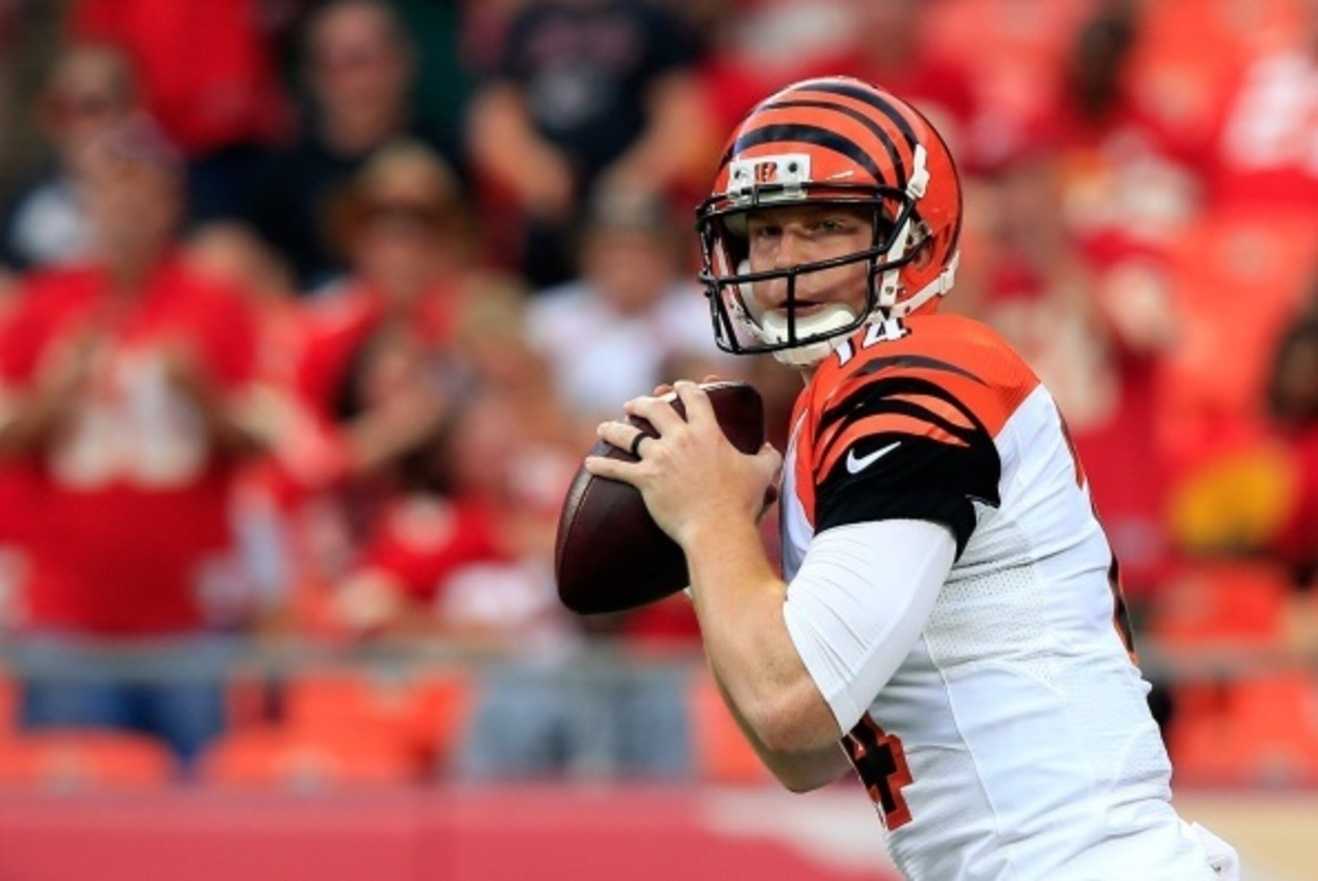 KANSAS CITY, MO - AUGUST 07:  Quarterback Andy Dalton #14 of the Cincinnati Bengals in action during the preseason game against the Kansas City Chiefs at Arrowhead Stadium on August 7, 2014 in Kansas City, Missouri.  (Photo by Jamie Squire/Getty Images)