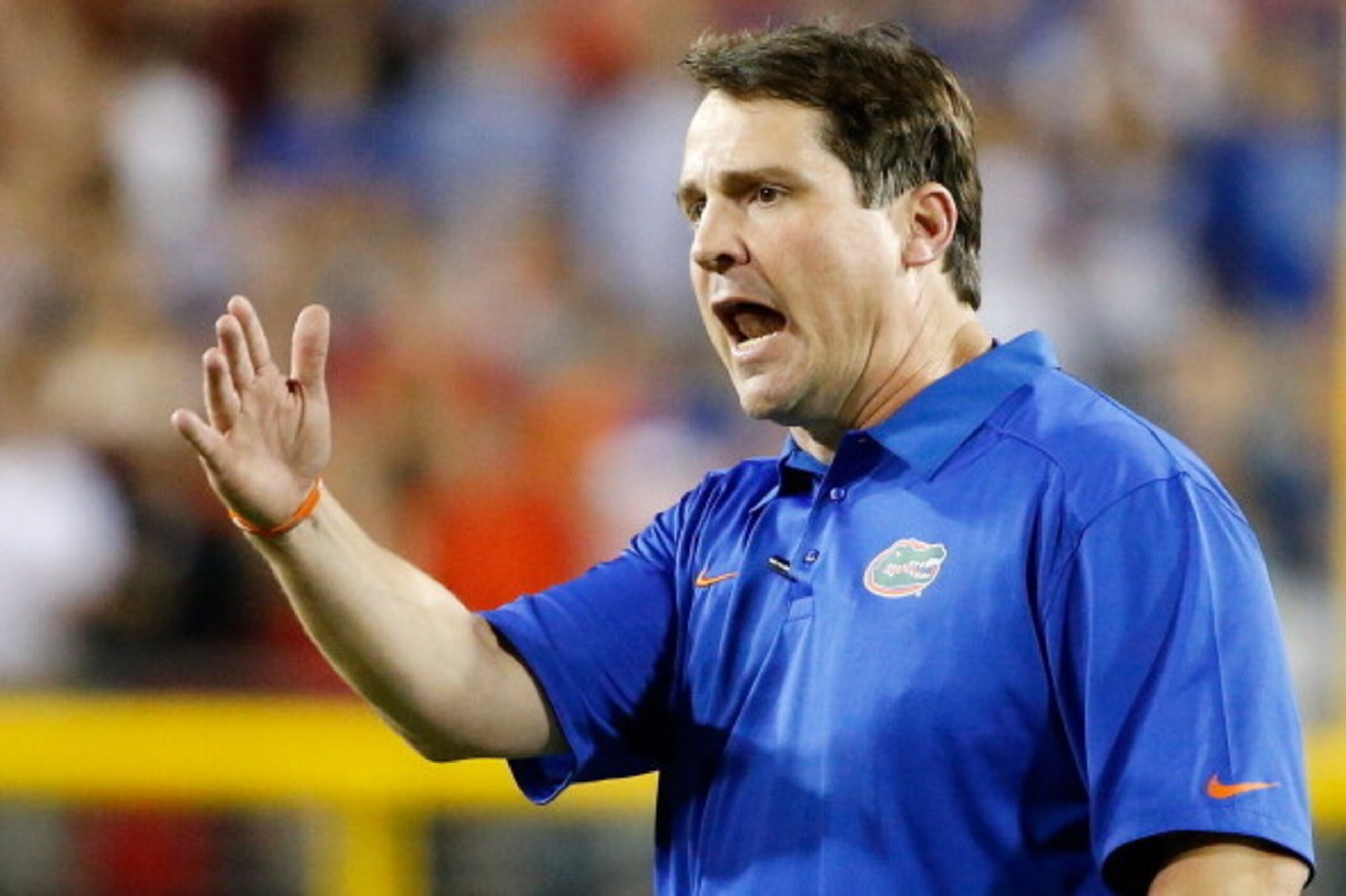 JACKSONVILLE, FL - NOVEMBER 02:  Head coach Will Muschamp of the Florida Gators gestures during the game against the Georgia Bulldogs at EverBank Field on November 2, 2013 in Jacksonville, Florida.  (Photo by Sam Greenwood/Getty Images)