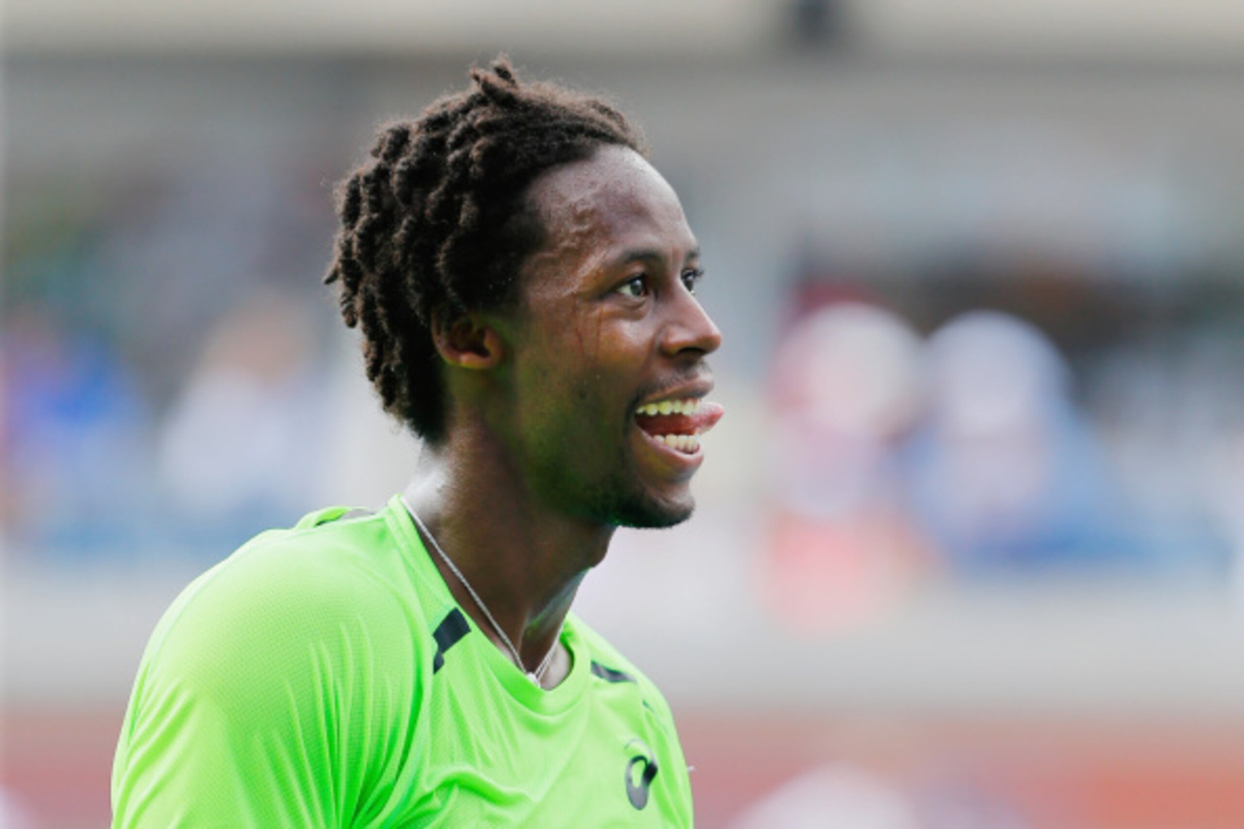 NEW YORK, NY - SEPTEMBER 02:  Gael Monfils of France celebrates after defeating Grigor Dimitrov of Bulgaria in their men's singles fourth round match on Day Nine of the 2014 US Open at the USTA Billie Jean King National Tennis Center on September 2, 2014 