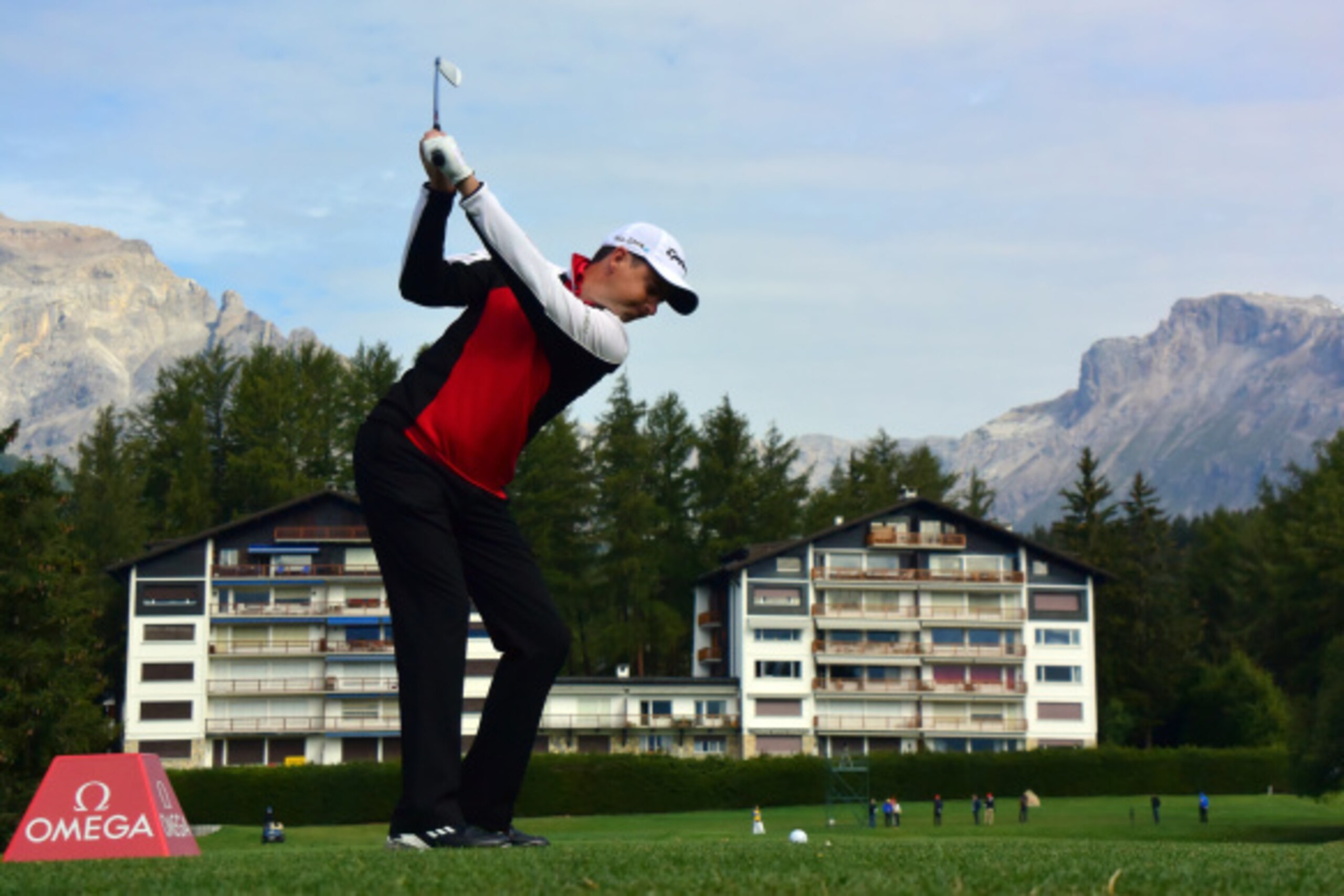 CRANS-MONTANA, SWITZERLAND - SEPTEMBER 04:  Peter Lawrie of Ireland plays a shot during the first round of the Omega European Masters at Crans-sur-Sierre Golf Club on September 4, 2014 in Crans-Montana, Switzerland.  (Photo by Stuart Franklin/Getty Images