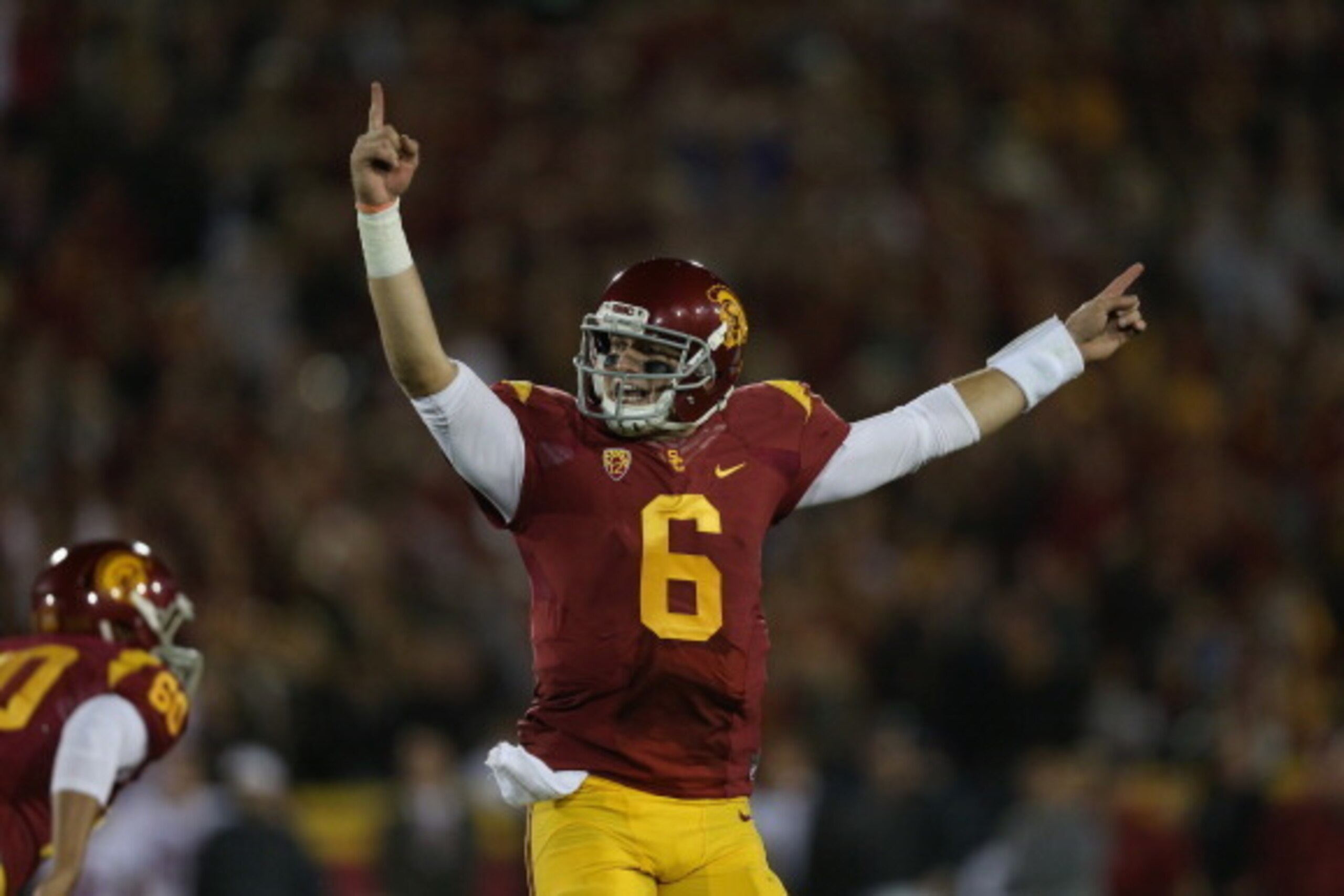 LOS ANGELES, CA - NOVEMBER 16:  Quarterback Cody Kessler #6 of the USC Trojans celebrates after kicker Andre Heidari (not pictured) of the USC Trojans kicked the go ahead field goal in the closing seconds of the game against the Stanford Cardinal at Los A