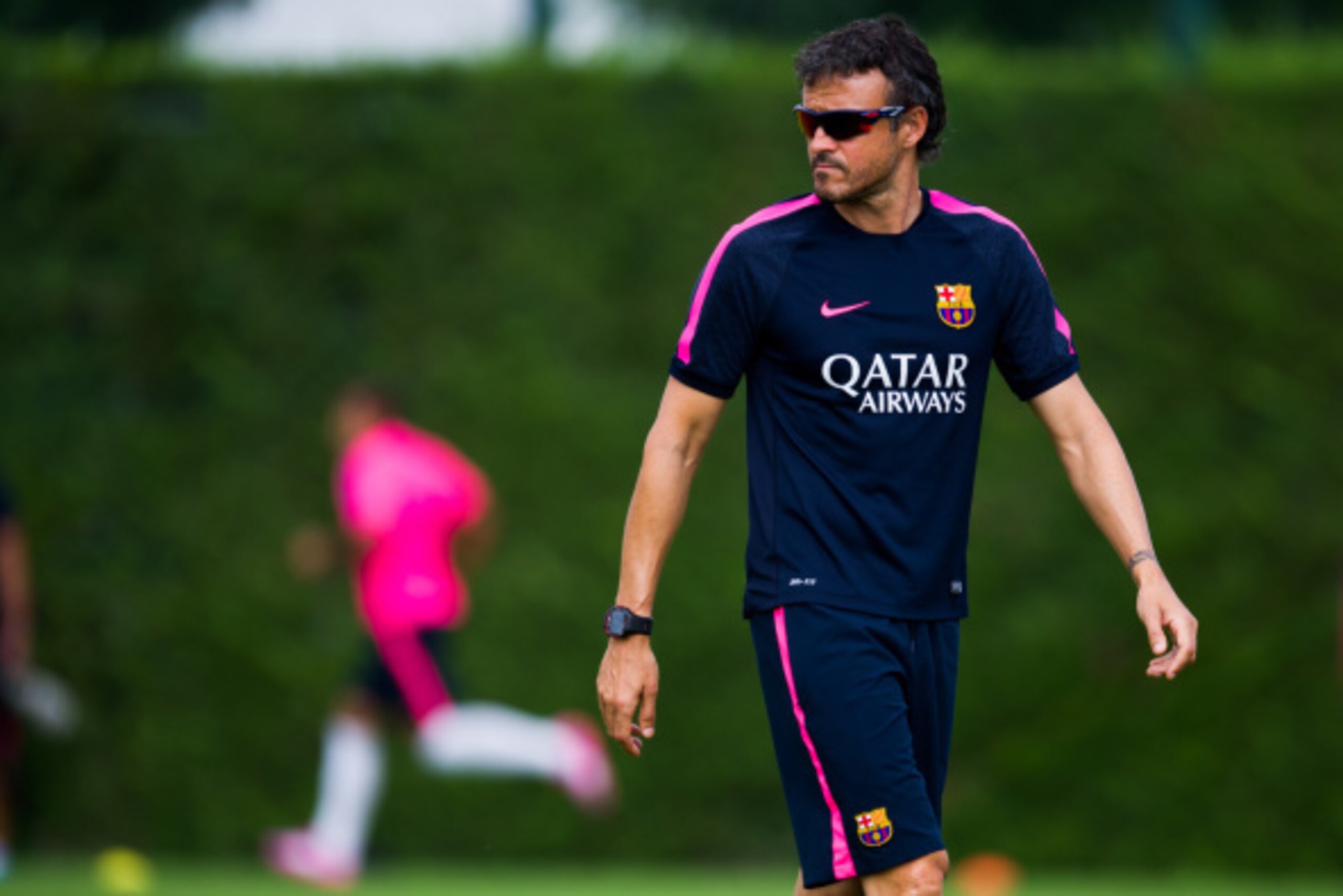 BARCELONA, SPAIN - AUGUST 17:  Head coach Luis Enrique looks on during a FC Barcelona training session at Ciutat Esportiva on August 17, 2014 in Barcelona, Spain.  (Photo by Alex Caparros/Getty Images)