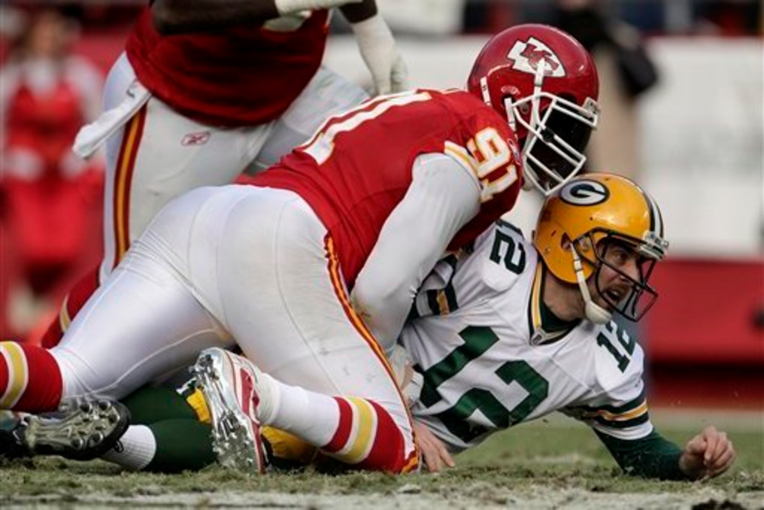 Tamba Hali sacked Aaron Rodgers three times to help the Chiefs hand the Packers their first loss of the 2011 season after going 13-0.