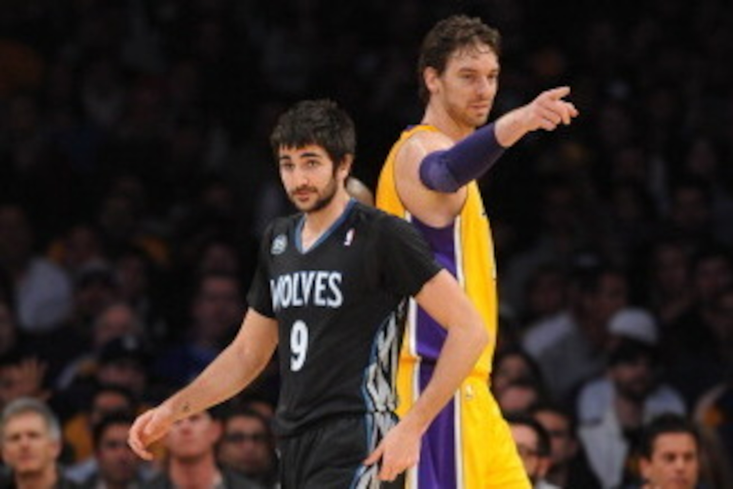 LOS ANGELES, CA - DECEMBER 20: Ricky Rubio #9 of the Minnesota Timberwolves and Pau Gasol #16 of the Los Angeles Lakers look on during their game at Staples Center on December 20, 2013 in Los Angeles, California. NOTE TO USER: User expressly acknowledges 