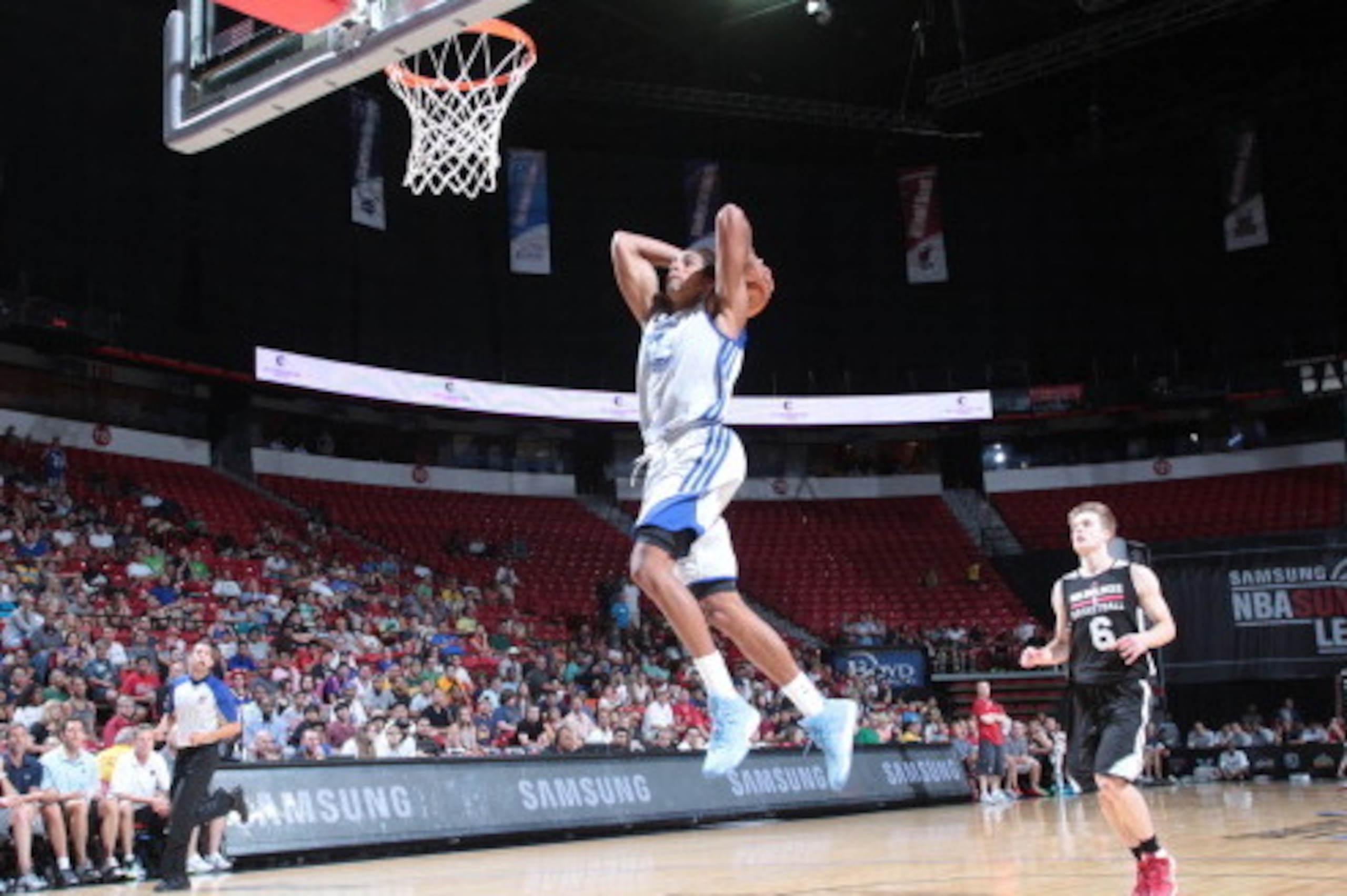 LAS VEGAS, NV - JULY 18: James Michael McAdoo #43 of the Golden State Warriors dunks against the Milwaukee Bucks at the Samsung NBA Summer League 2014 on July 18, 2014 at the Thomas & Mack Center in Las Vegas, Nevada. NOTE TO USER: User expressly acknowle