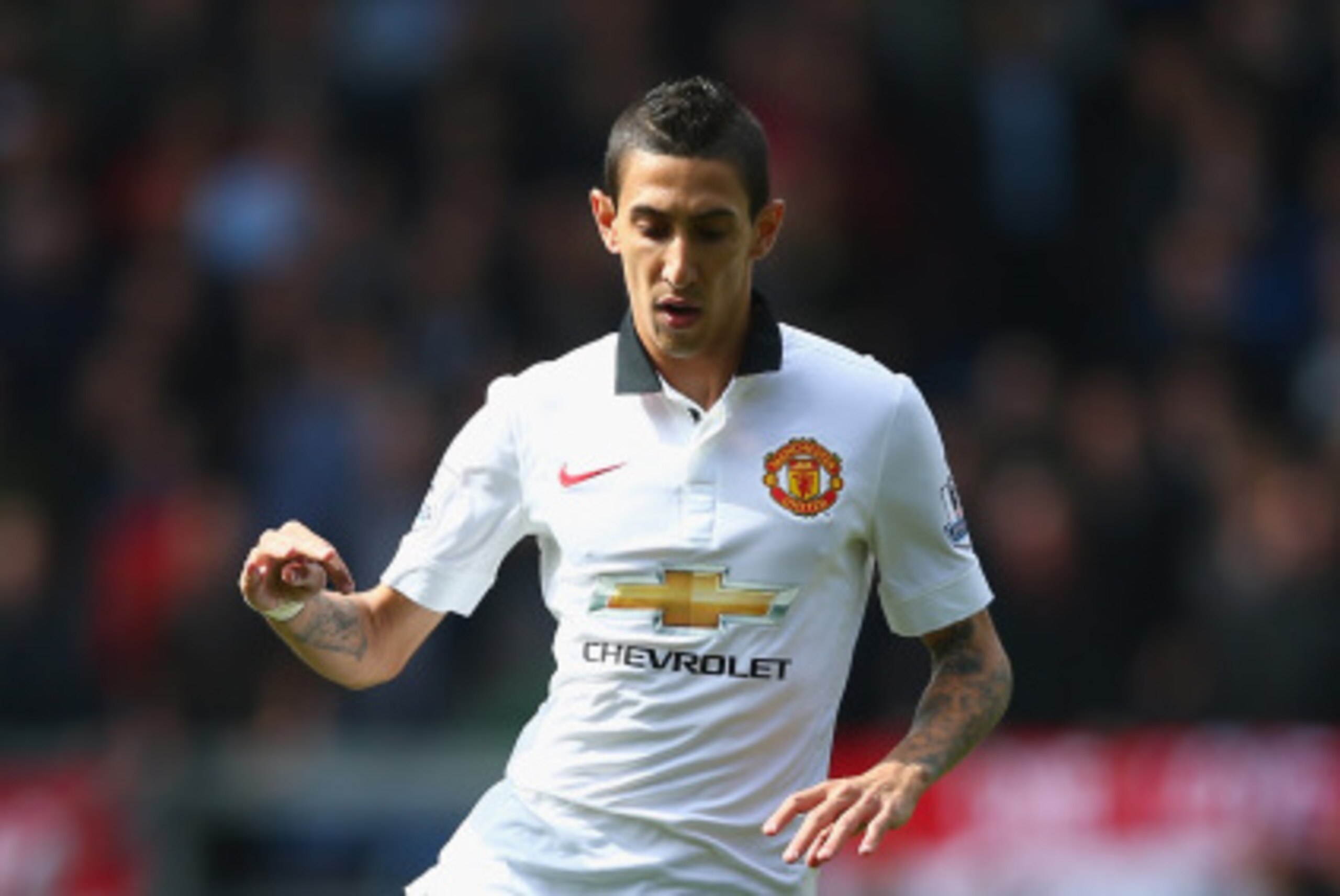 BURNLEY, ENGLAND - AUGUST 30:  Angel Di Maria of Manchester United in action during the Barclays Premier League match between Burnley and Manchester United at Turf Moor on August 30, 2014 in Burnley, England.  (Photo by Clive Brunskill/Getty Images)