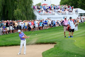 CHERRY HILLS VILLAGE, CO - SEPTEMBER 04:  Rory McIlroy of Northern Ireland hits his third shot on the 8th hole during the first round of the BMW Championship at the Cherry Hills Country Club on September 4, 2014 in Cherry Hills Village, Colorado.  (Photo 