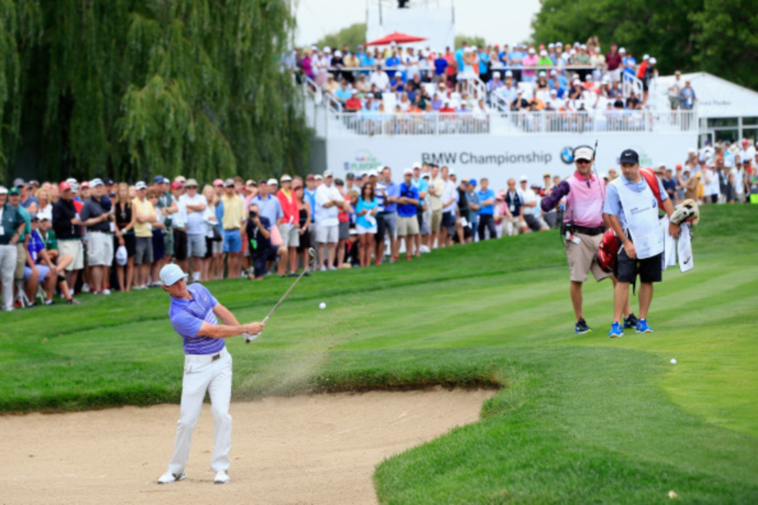 CHERRY HILLS VILLAGE, CO - SEPTEMBER 04:  Rory McIlroy of Northern Ireland hits his third shot on the 8th hole during the first round of the BMW Championship at the Cherry Hills Country Club on September 4, 2014 in Cherry Hills Village, Colorado.  (Photo 