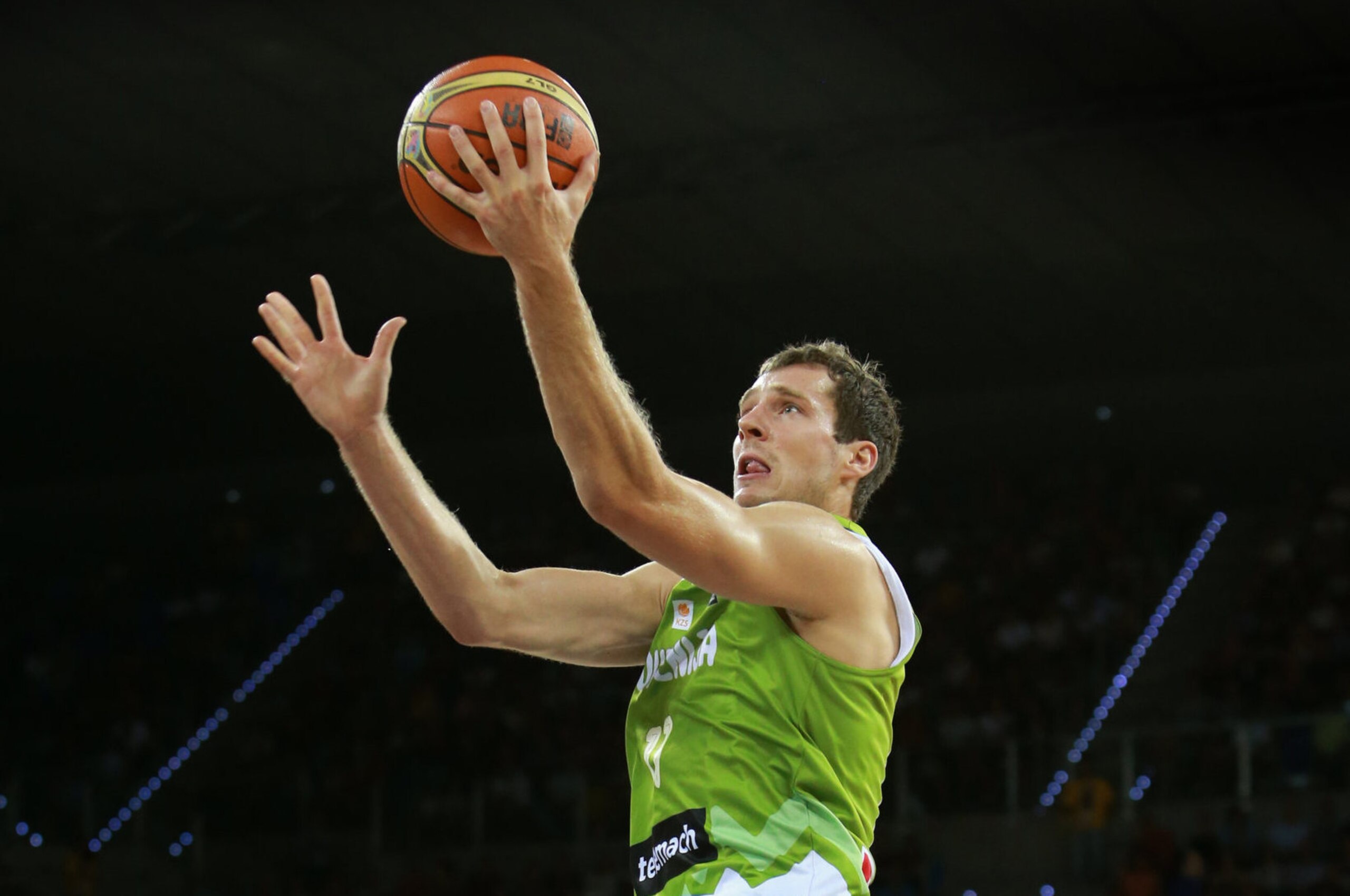 LAS PALMAS, GRAN CANARIA, SPAIN - AUGUST 26: Goran Dragic #11 of the Slovenia Basketball Men's National Team shoots against Rudy Gay #8 of the USA Basketball Men's National Team on August 26, 2014 at Gran Canaria Arena in Las Palmas, Gran Canaria, Spain.