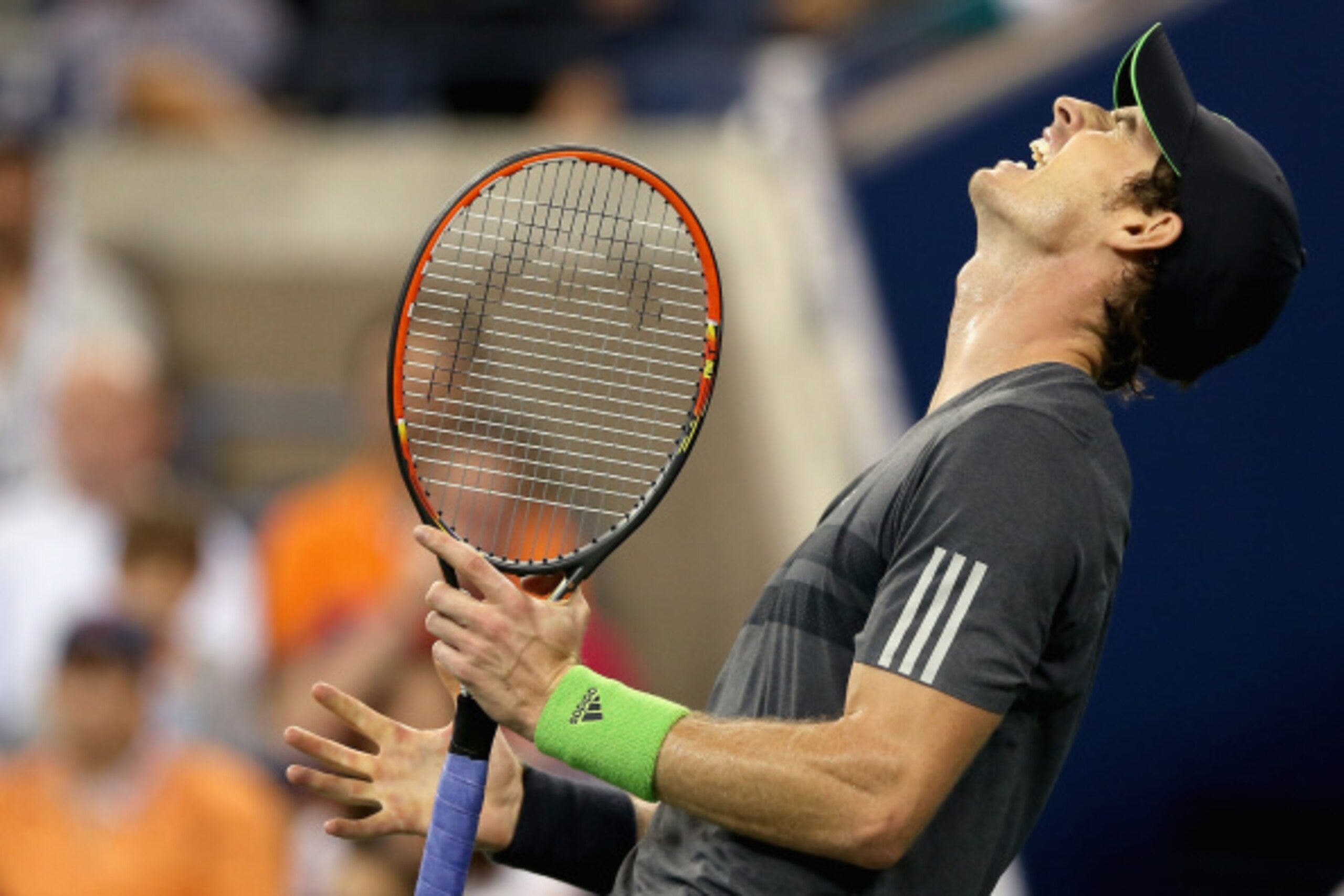 NEW YORK, NY - SEPTEMBER 03:  Andy Murray of Great Britain reacts against Novak Djokovic of Serbia during their men's singles quarterfinal match on Day Ten of the 2014 US Open at the USTA Billie Jean King National Tennis Center on September 3, 2014 in the