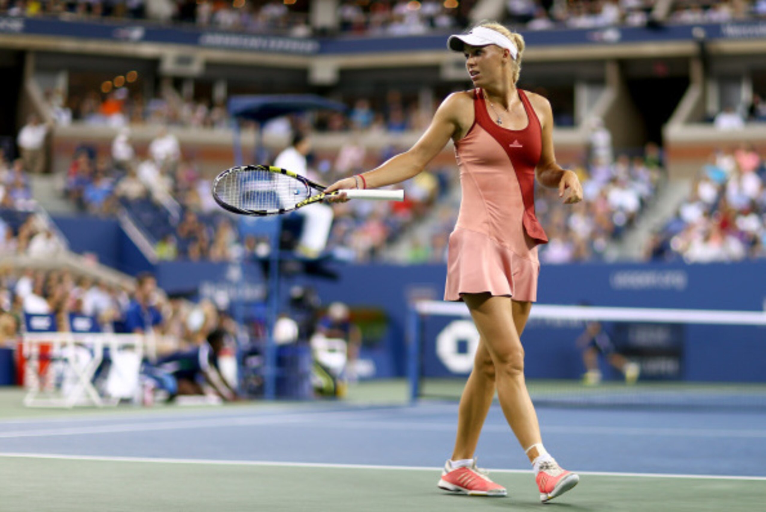 NEW YORK, NY - SEPTEMBER 02:  Caroline Wozniacki of Denmark looks on against Sara Errani of Italy during their women's singles quarterfinal on Day Nine of the 2014 US Open at the USTA Billie Jean King National Tennis Center on September 2, 2014 in the Flu