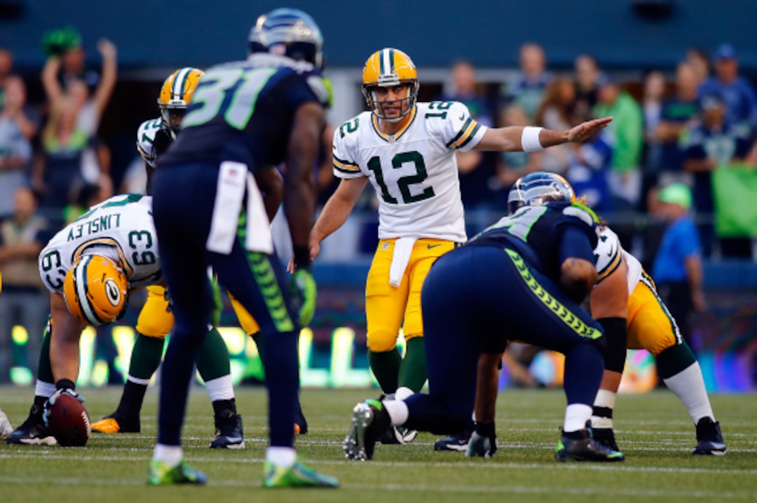 SEATTLE, WA - SEPTEMBER 04: Quarterback Aaron Rodgers #12 of the Green Bay Packers calls out a play at the line of scrimmage during the second quarter of the game against the Seattle Seahawks at CenturyLink Field on September 4, 2014 in Seattle, Washingto