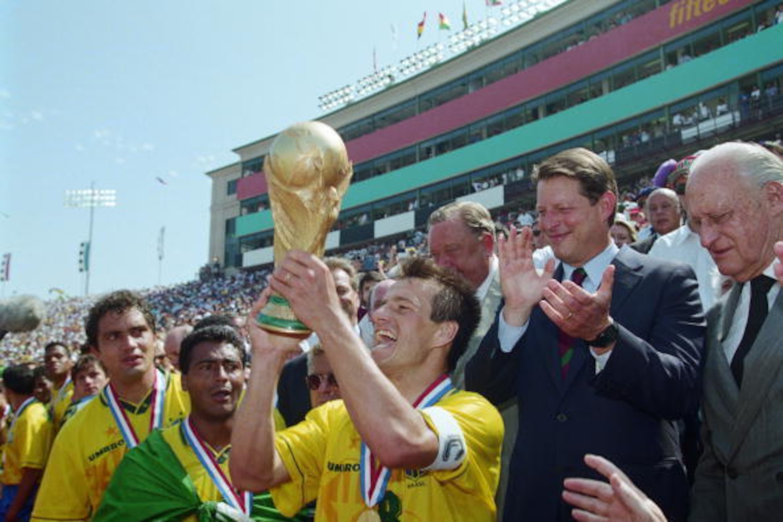 17 JUL 1994 :  BRAZILIAN CAPTAIN DUNGA RECEIVES THE WORLD CUP TROPHY FROM VICE PRESIDENT AL GORE AFTER DEFEATING ITALY IN THE 1994 WORLD CUP FINAL AT THE ROSE BOWL STADIUM IN PASADENA, CALIFORNIA.  BRAZIL WON THE WORLD CUP ON A PENALTY SHOOT-OUT. Mandator
