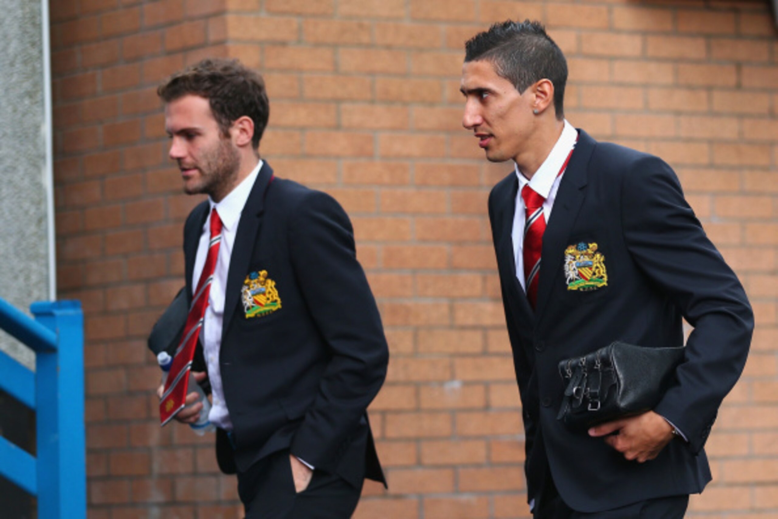 BURNLEY, ENGLAND - AUGUST 30:  Juan Mata and Angel di Maria of Manchester United arrive ahead of the Barclays Premier League match between Burnley and Manchester United at Turf Moor on August 30, 2014 in Burnley, England.  (Photo by Clive Brunskill/Getty 