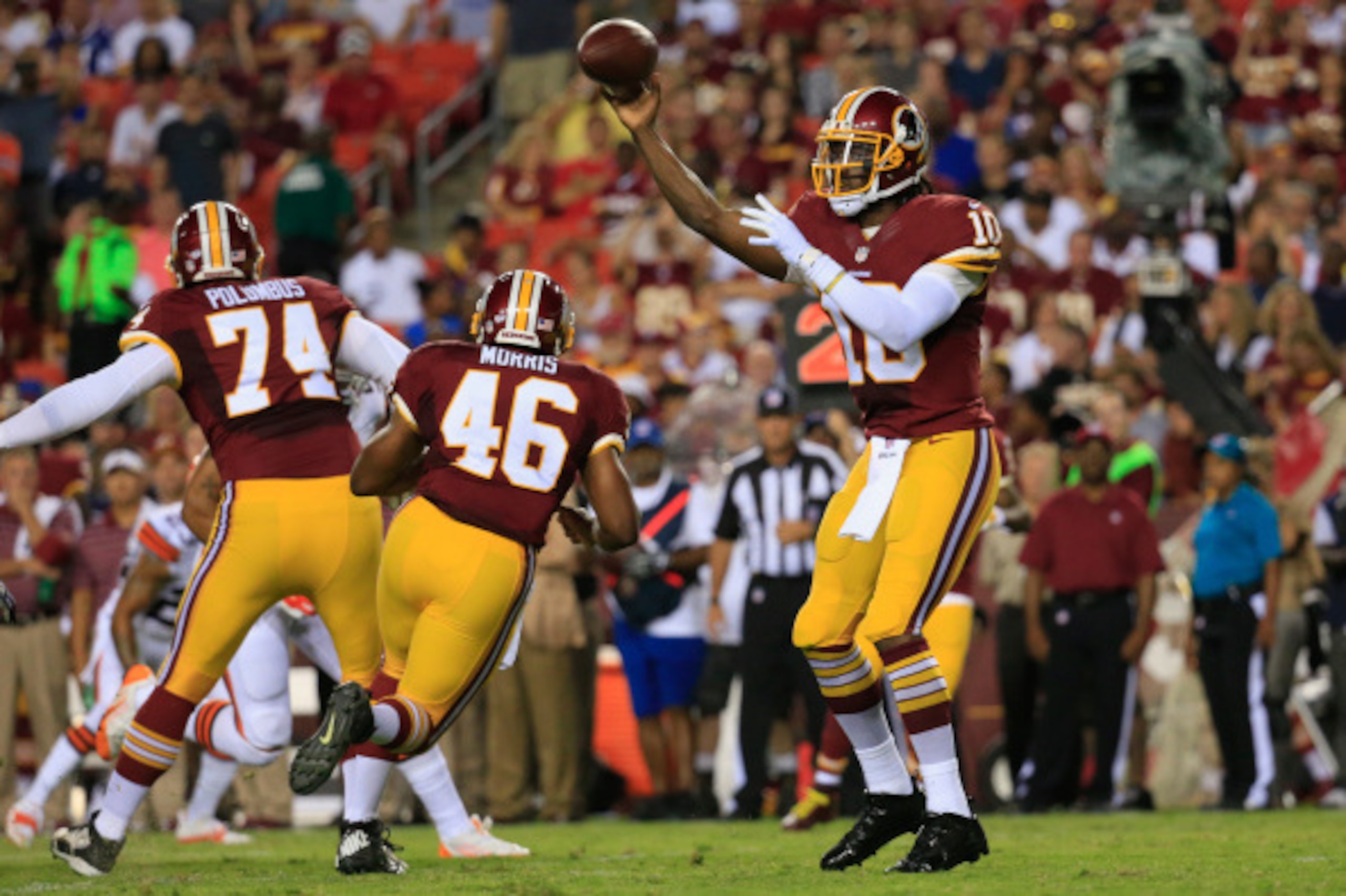 LANDOVER, MD - AUGUST 18: Quarterback Robert Griffin III #10 of the Washington Redskins throws a pass against the Cleveland Browns during a preseason game at FedExField on August 18, 2014 in Landover, Maryland.  (Photo by Rob Carr/Getty Images)