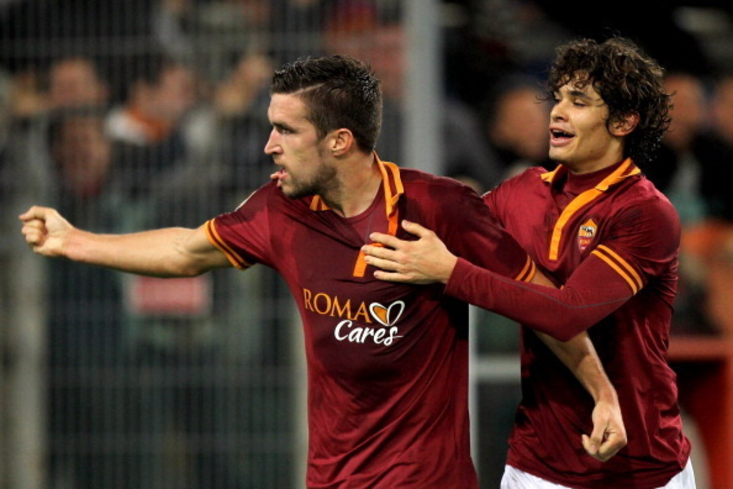 ROME, ITALY - JANUARY 18:  Kevin Strootman with his teammate Dodo #3 of AS Roma celebrates after scoring the second team's goal during the Serie A match between AS Roma and AS Livorno Calcio at Stadio Olimpico on January 18, 2014 in Rome, Italy.  (Photo b