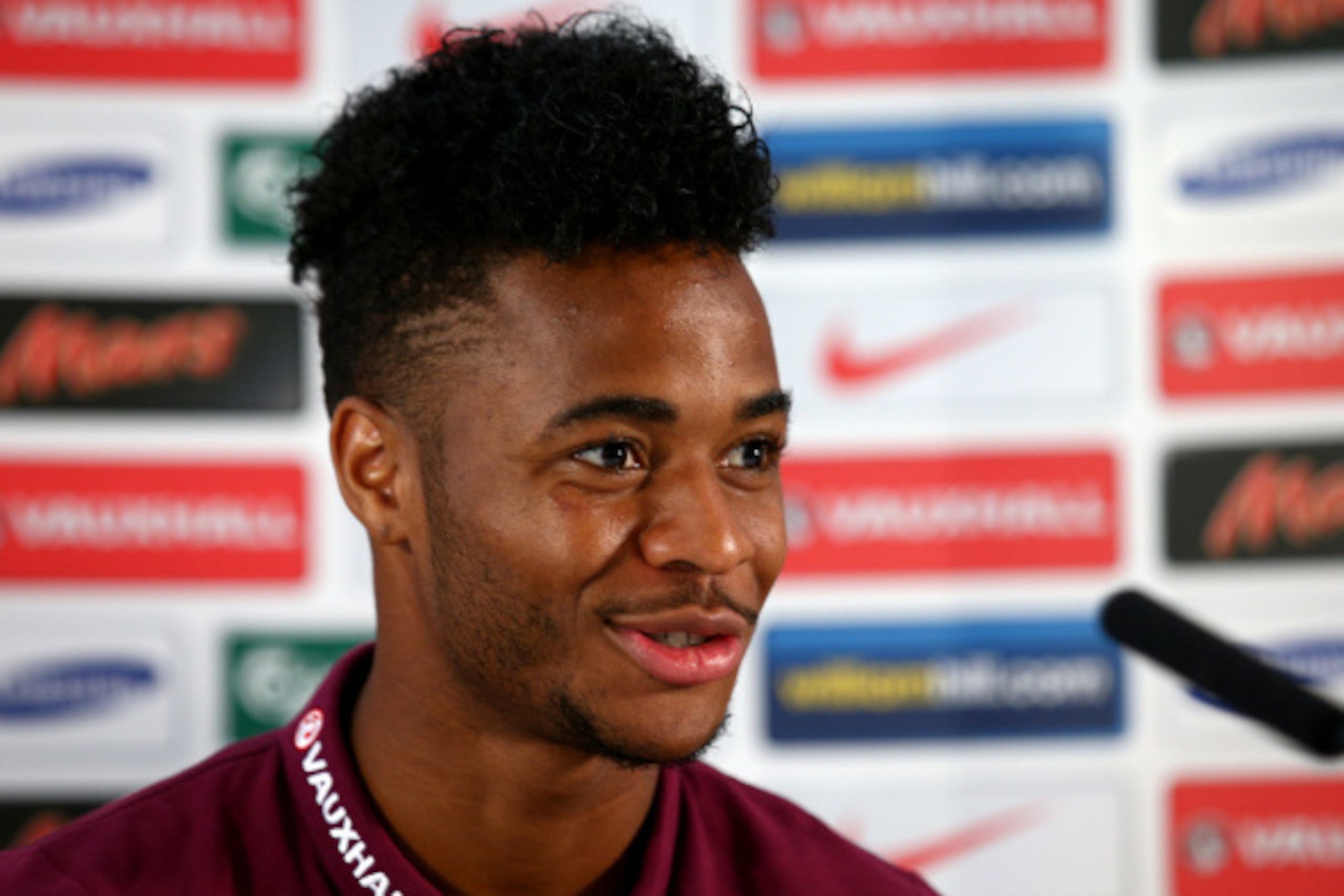 LONDON, ENGLAND - SEPTEMBER 01:  Raheem Sterling speaks to the press during a England Press Conference before the international friendly match against Norway at the Grove hotel on September 1, 2014 in London, England.  (Photo by Ian Walton/Getty Images)