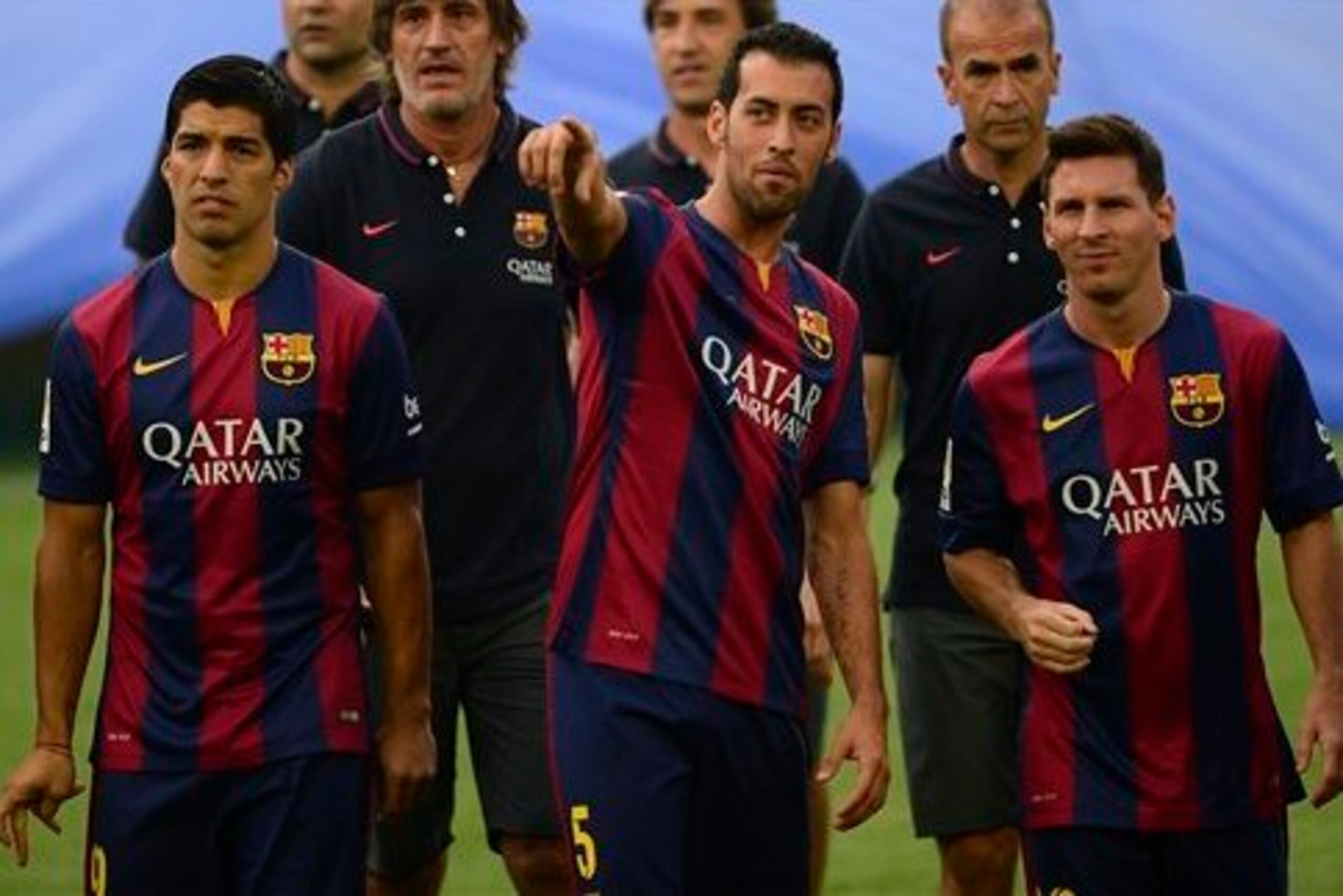 Suarez needs to work well with Messi (right).