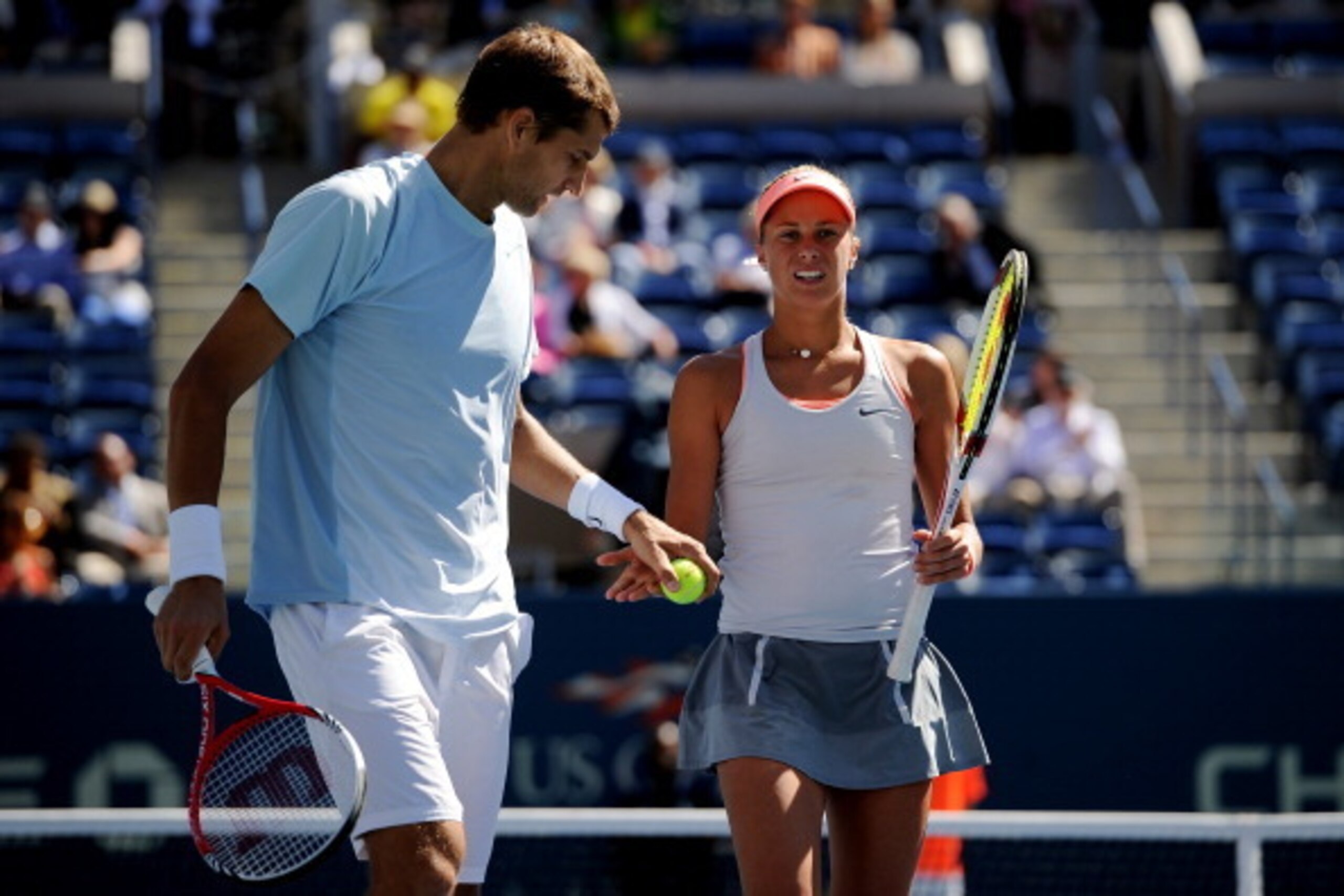 NEW YORK, NY - SEPTEMBER 06:  Max Mirnyi of Belarus taps hands with his partner Andrea Hlavackova of Czech Republic during their mixed doubles final match against Abigail Spears of the United States of America and Santiago Gonzalez of Mexico on Day Twelve