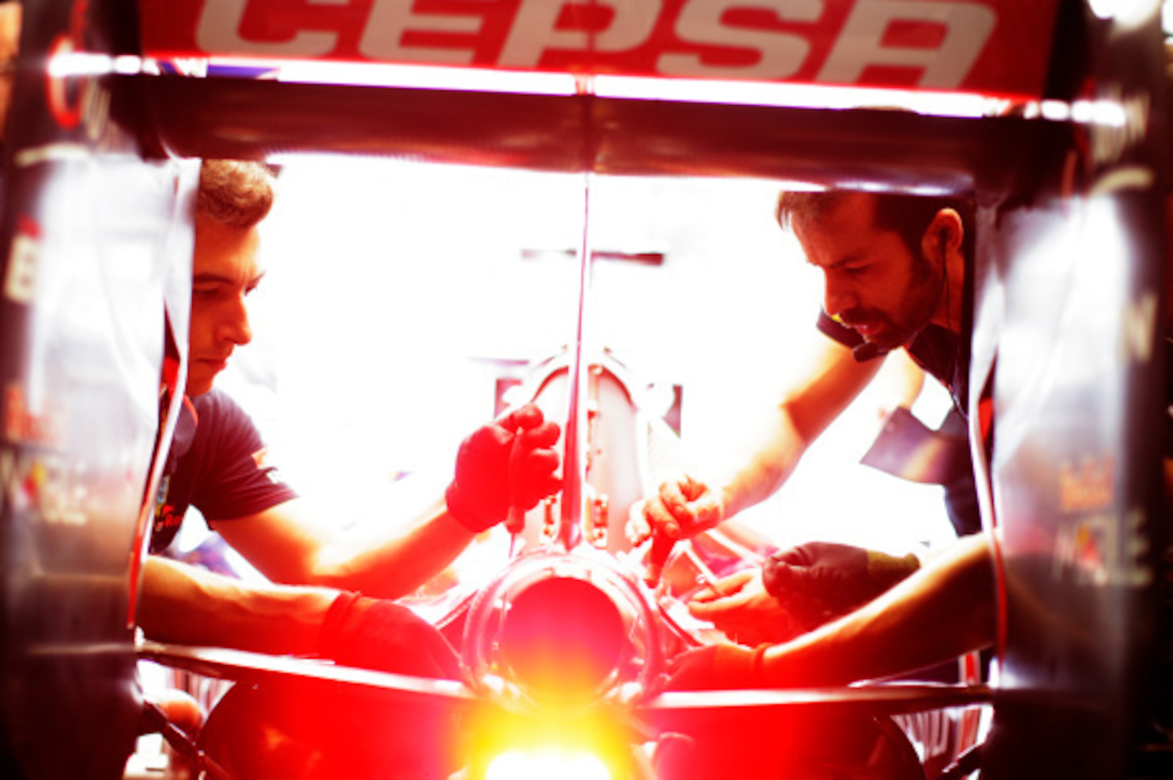 MONZA, ITALY - SEPTEMBER 05:  Toro Rosso pit crew in action during Practice ahead of the F1 Grand Prix of Italy at Autodromo di Monza on September 5, 2014 in Monza, Italy.  (Photo by Adam Pretty/Getty Images)