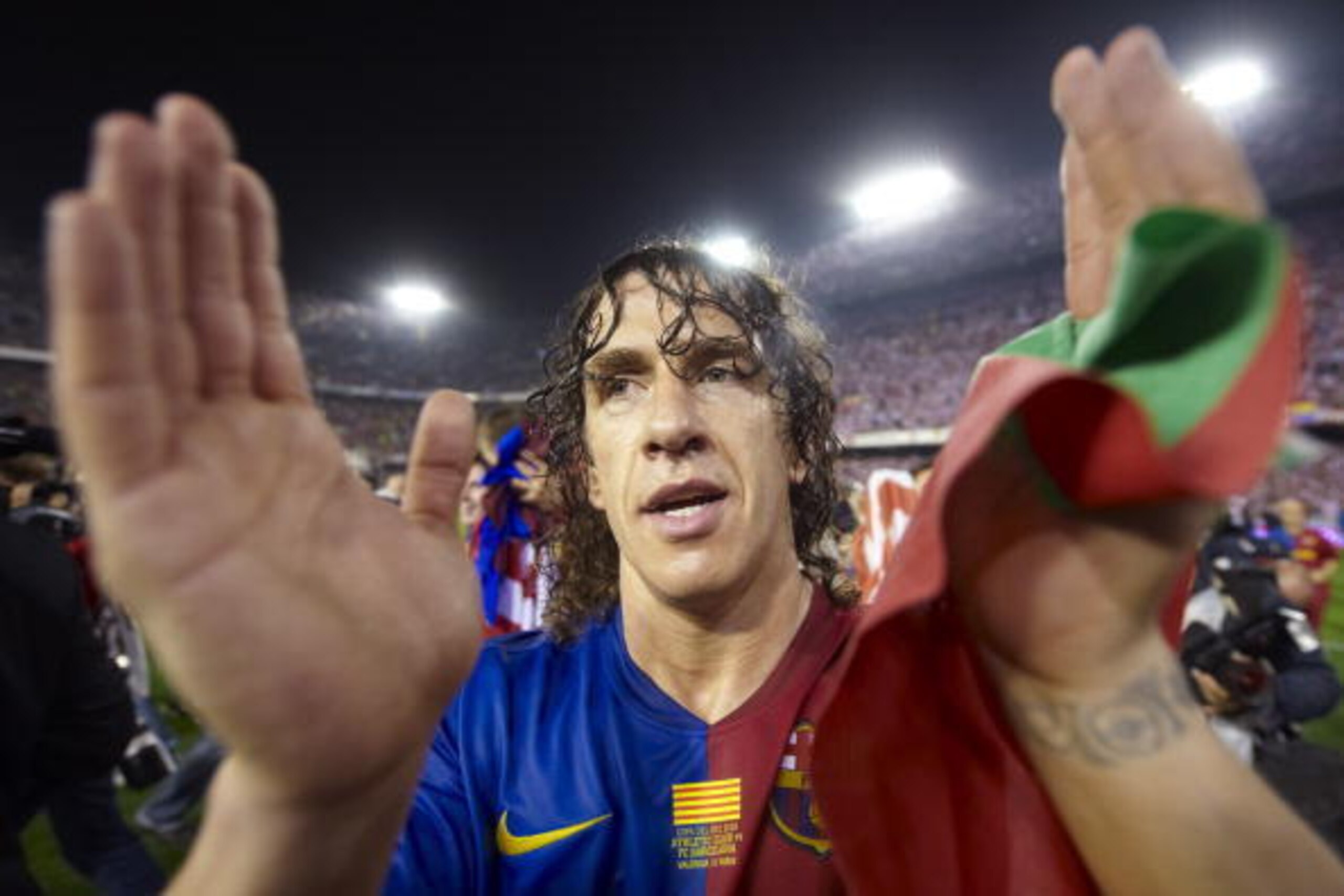 VALENCIA, SPAIN - MAY 13:  Carles Puyol of Barcelona reacts before the Copa del Rey final match between Barcelona and Athletic Bilbao at the Mestalla stadium on May 13, 2009 in Valencia, Spain. Barcelona won 4-1.  (Photo by Manuel Queimadelos Alonso/Getty