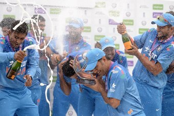 LEEDS, ENGLAND - SEPTEMBER 05:  Mahendra Singh Dhoni of India lifts the trophy after winning the Royal London One Day International series between England and India at Headingley on September 5, 2014 in Leeds, England.  (Photo by Gareth Copley/Getty Image
