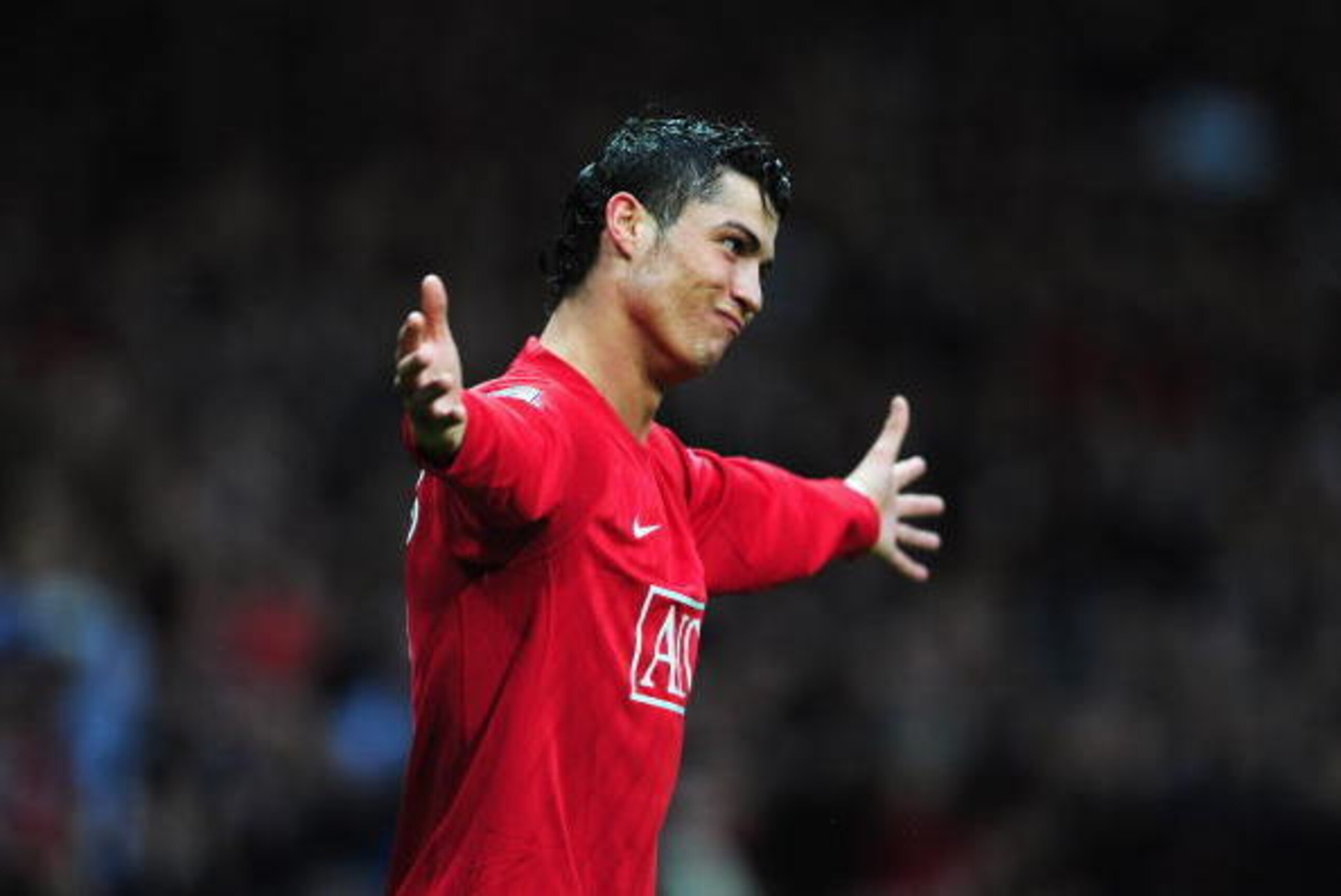 MANCHESTER, UNITED KINGDOM - MARCH 29:  Cristiano Ronaldo of Man.Utd icelebrates after scoring the opening goal during the Barclays Premier League match between Manchester United and Aston Villa at Old Trafford on March 29, 2008 in Manchester, England.  (