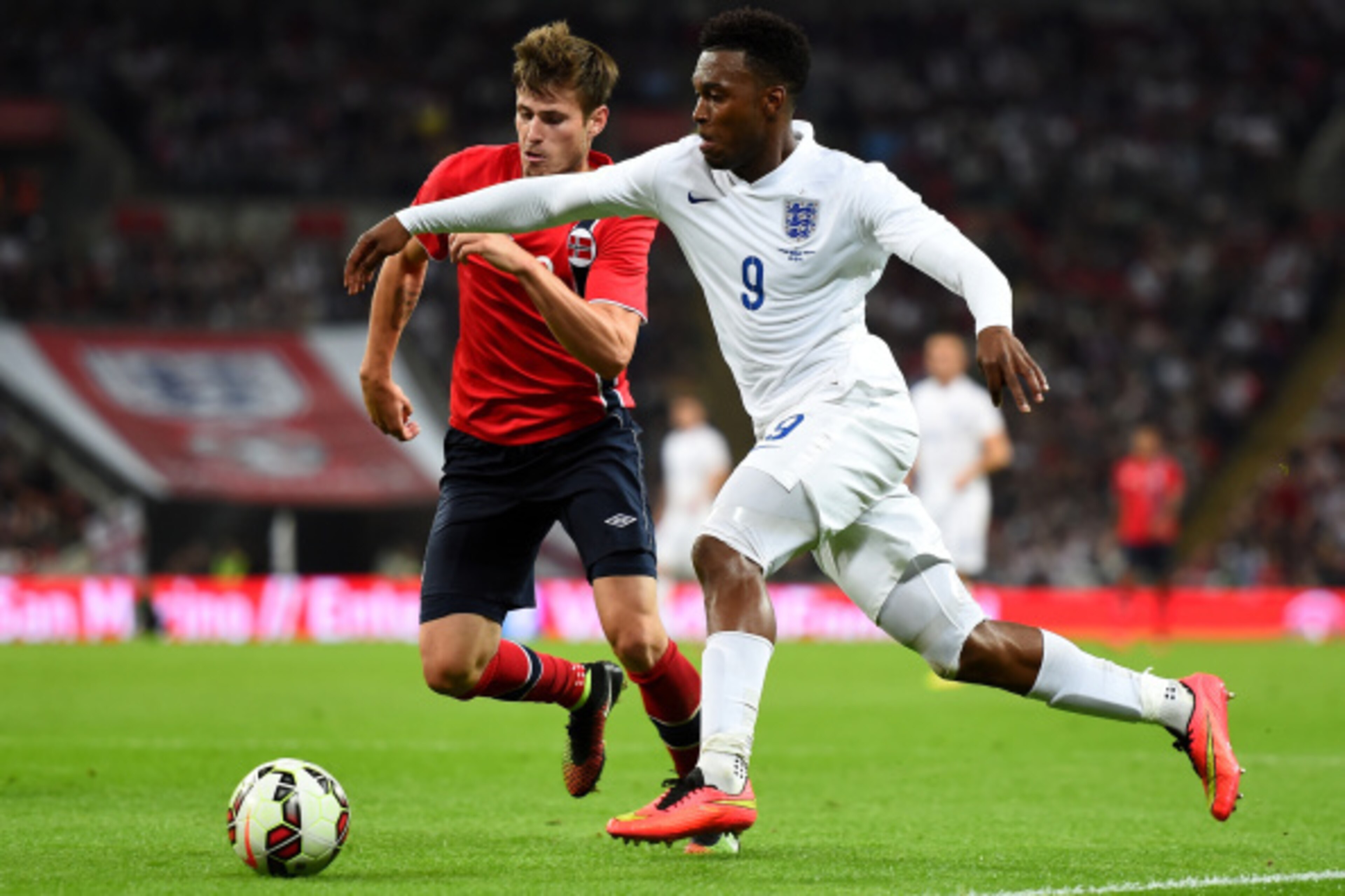 LONDON, ENGLAND - SEPTEMBER 03: Daniel Sturridge of England (R) runs past Havard Nordtveit of Norway during the International friendly match between England and Norway at Wembley Stadium on September 3, 2014 in London, England. (Photo by Laurence Griffi LONDON, ENGLAND - SEPTEMBER 03: Daniel Sturridge of England (R) runs past Havard Nordtveit of Norway during the International friendly match between England and Norway at Wembley Stadium on September 3, 2014 in London, England. (Photo by Laurence Griffi