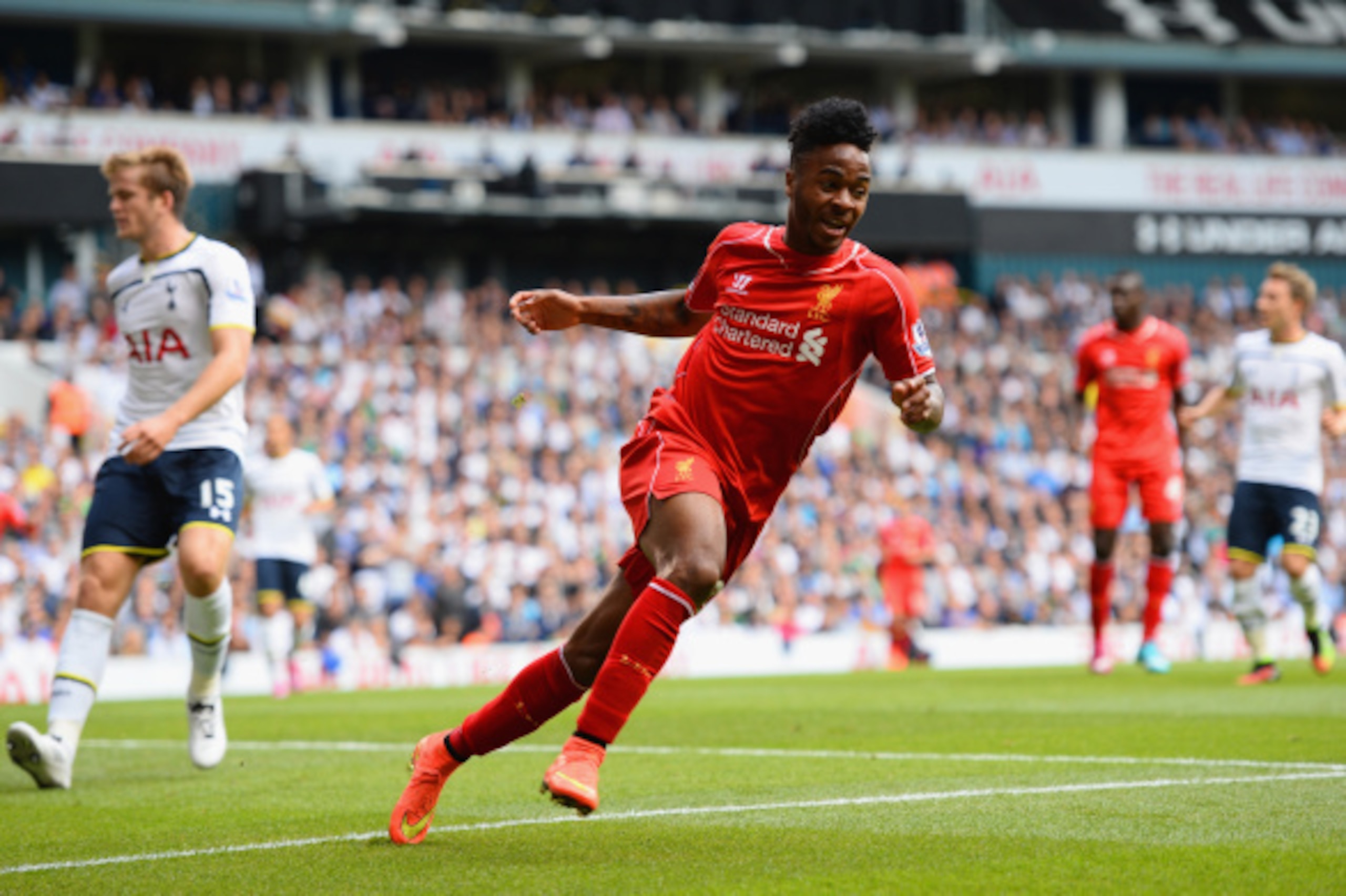 LONDON, ENGLAND - AUGUST 31:  Raheem Sterling of Liverpool celebrates scoring the opening goal during the Barclays Premier League match between Tottenham Hotspur and Liverpool at White Hart Lane on August 31, 2014 in London, England.  (Photo by Jamie McDo