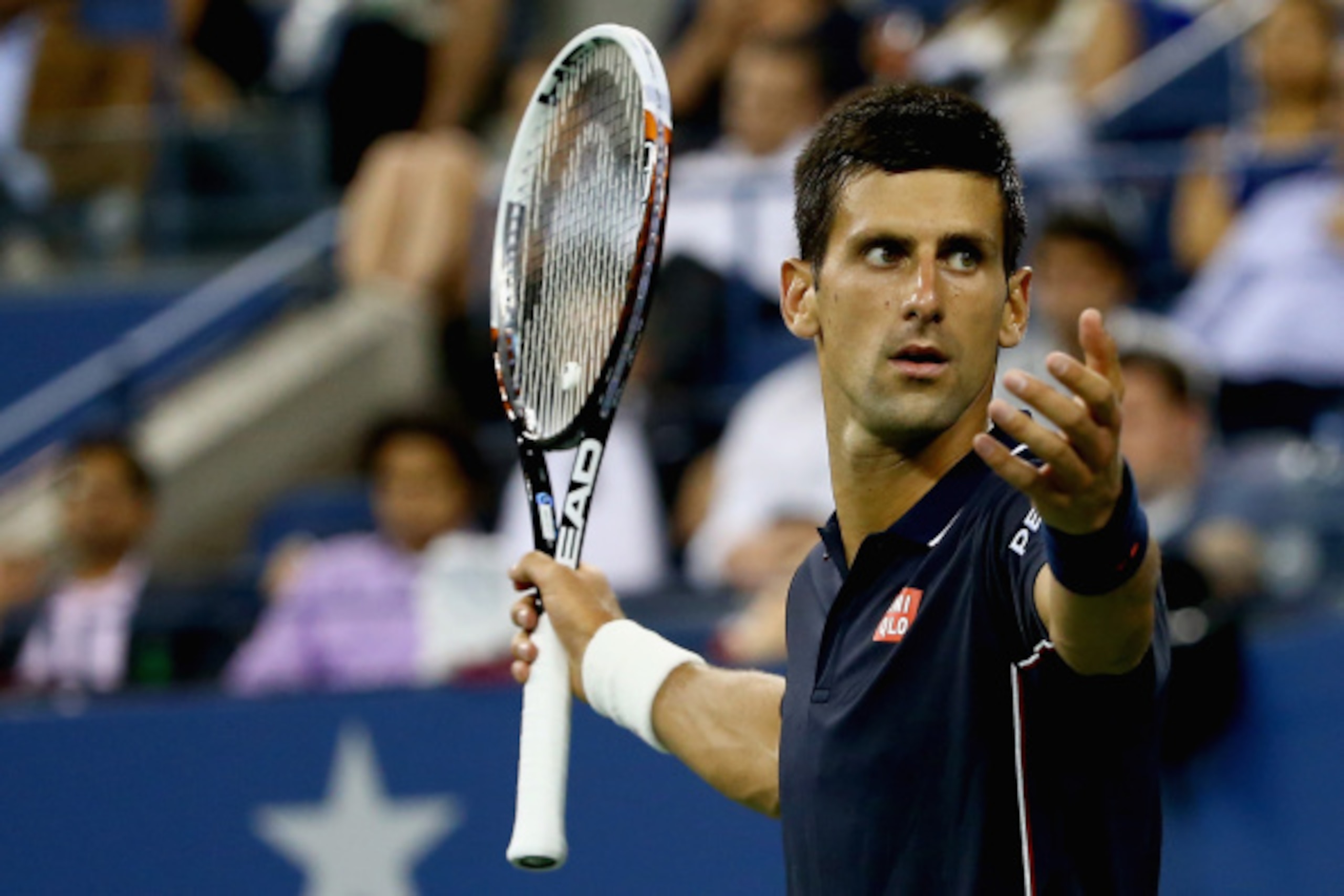NEW YORK, NY - SEPTEMBER 03:  Novak Djokovic of Serbia reacts against Andy Murray of Great Britain during their men's singles quarterfinal match on Day Ten of the 2014 US Open at the USTA Billie Jean King National Tennis Center on September 3, 2014 in the