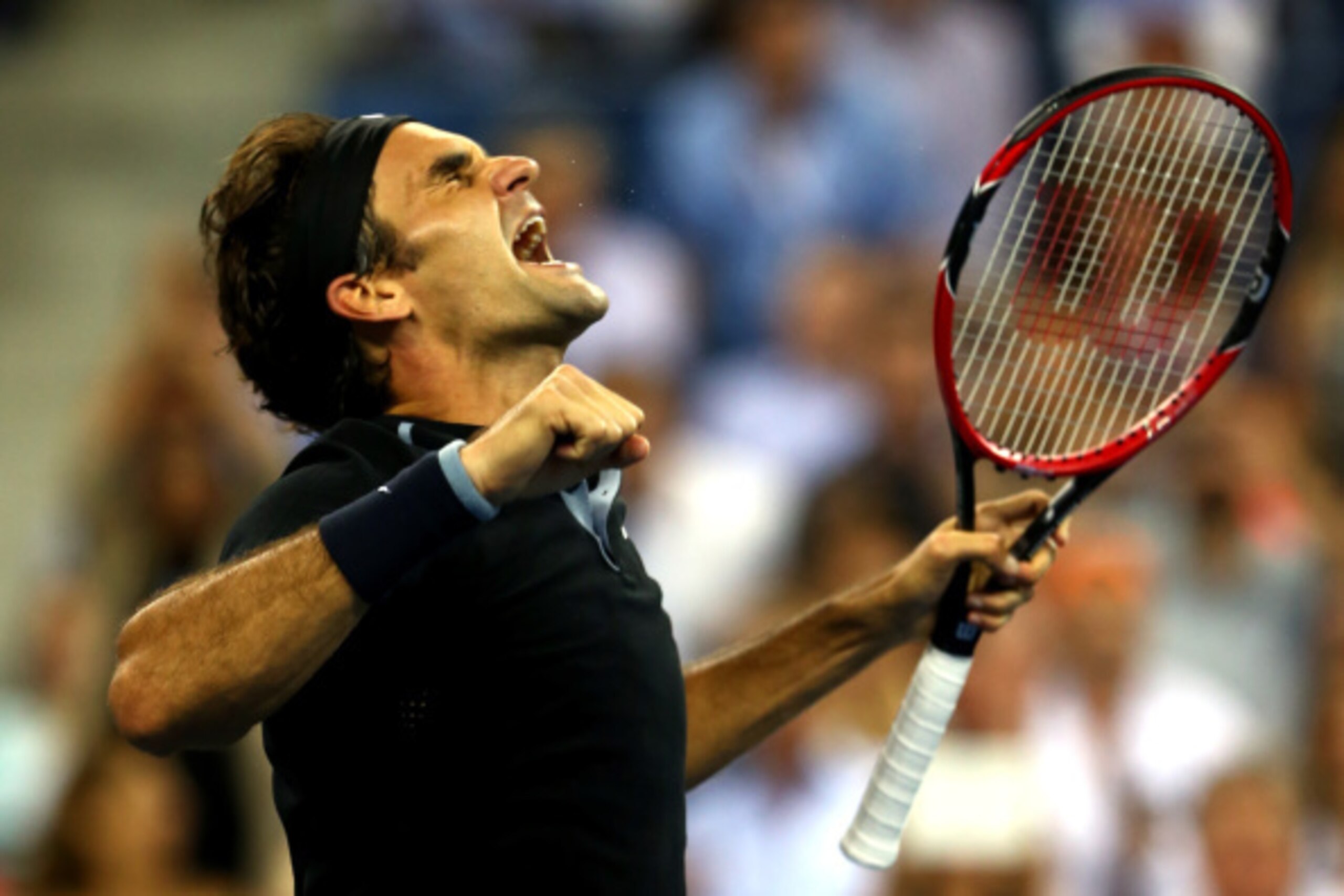 NEW YORK, NY - SEPTEMBER 04:  Roger Federer of Switzerland celebrates after defeating Gael Monfils of France during their men's singles quarterfinal match on Day Eleven of the 2014 US Open at the USTA Billie Jean King National Tennis Center on September 3
