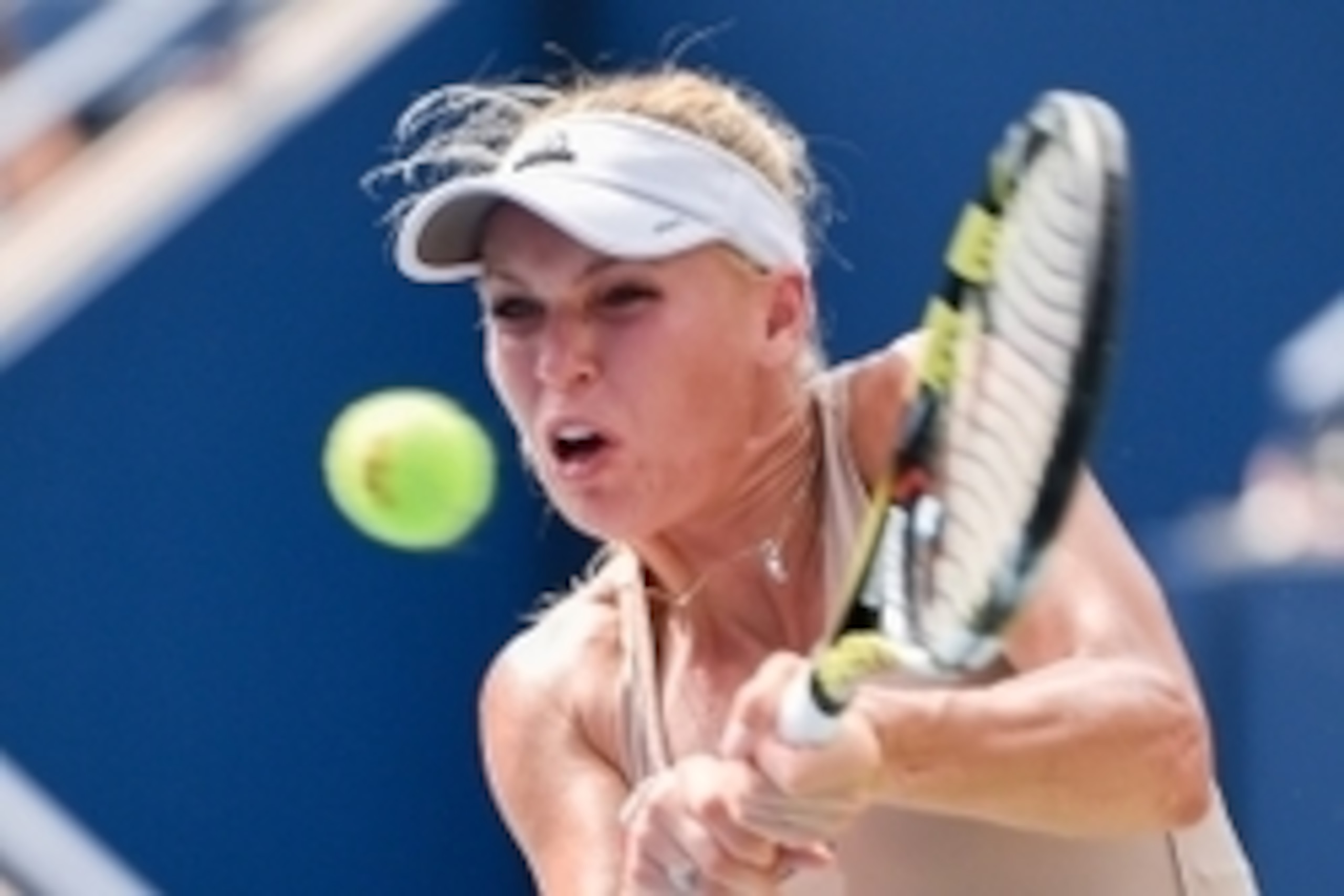 Sep 4, 2014; New York, NY, USA; Caroline Wozniacki (DEN) returns a shot to Peng Shuai (CHN) on day eleven of the 2014 U.S. Open tennis tournament at USTA Billie Jean King National Tennis Center. Mandatory Credit: Robert Deutsch-USA TODAY Sports