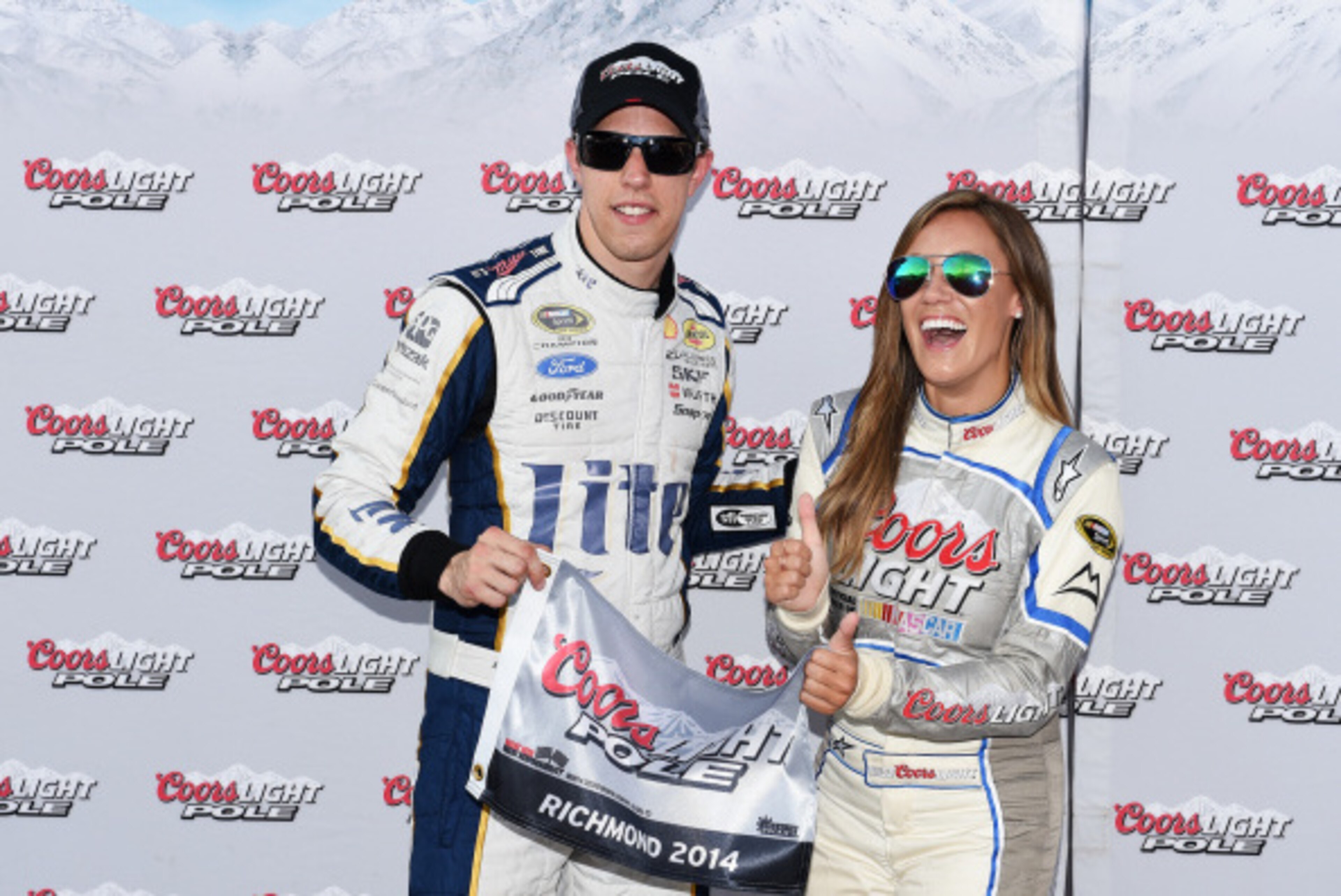 RICHMOND, VA - SEPTEMBER 05:  Brad Keselowski, driver of the #2 Miller Lite Ford, left, poses with Miss Coors Light Rachel Rupert and the Coors Light Pole Award after qualifying for the pole during qualifying for the NASCAR Sprint Cup Series Federated Aut