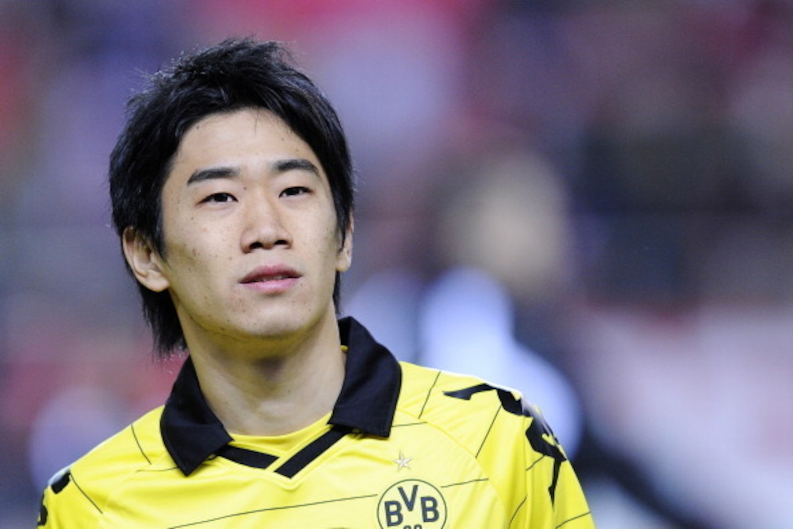 SEVILLE, SPAIN - DECEMBER 15:  Shinji Kagawa of Borussia Dortmund looks on prior the UEFA Europa League group J match between Sevilla and Borussia Dortmund at Estadio Ramon Sanchez Pizjuan on December 15, 2010 in Seville, Spain. The match ended 2-2.  (Pho