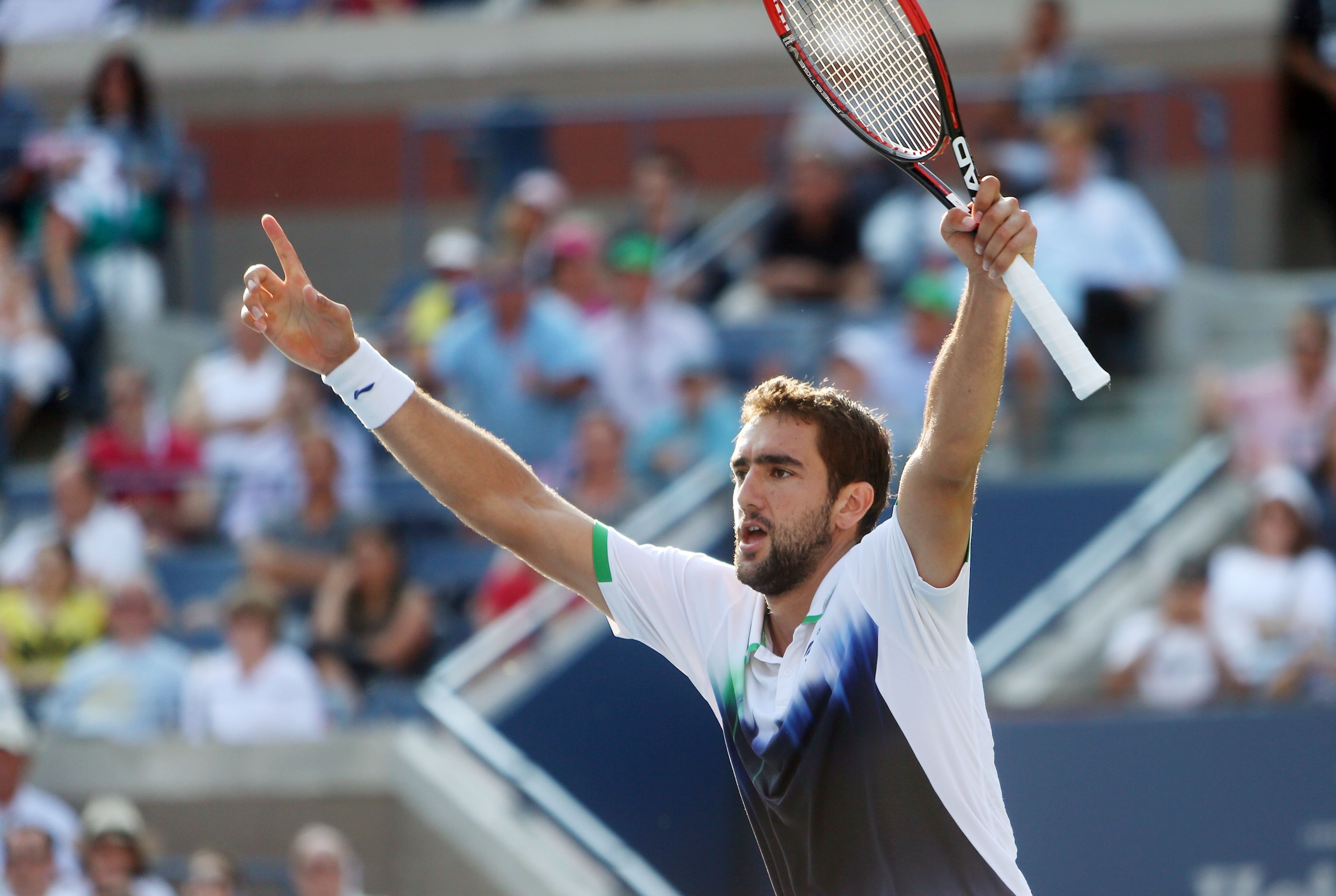 Sep 4, 2014; New York, NY, USA; Marin Cilic (CRO) celebrates after recording match point against Tomas Berdych (CZE) on day eleven of the 2014 U.S. Open tennis tournament at USTA Billie Jean King National Tennis Center. Mandatory Credit: Jerry Lai-USA TOD