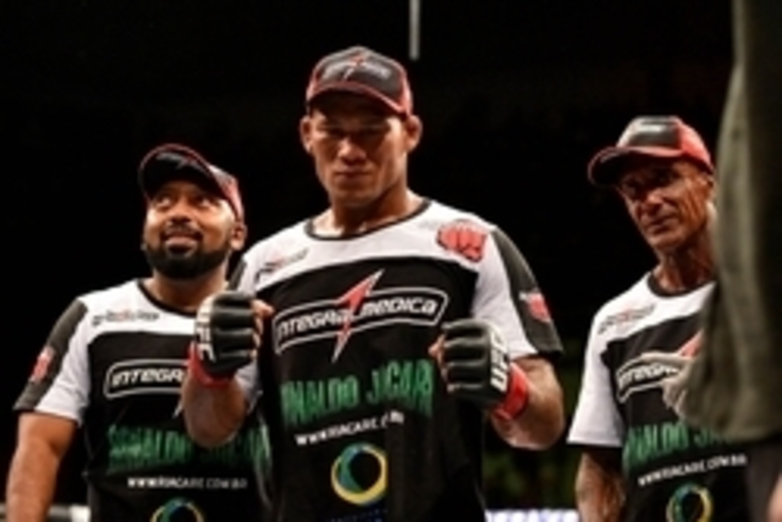 Feb 15, 2014; Jaragua do Sul, SC, Brazil; Ronaldo Souza (red gloves) after defeating Francis Carmont (blue gloves) during UFC Fight Night Machida vs Mousasi at Arena Jaragua. Mandatory Credit: Jason Silva-USA TODAY Sports