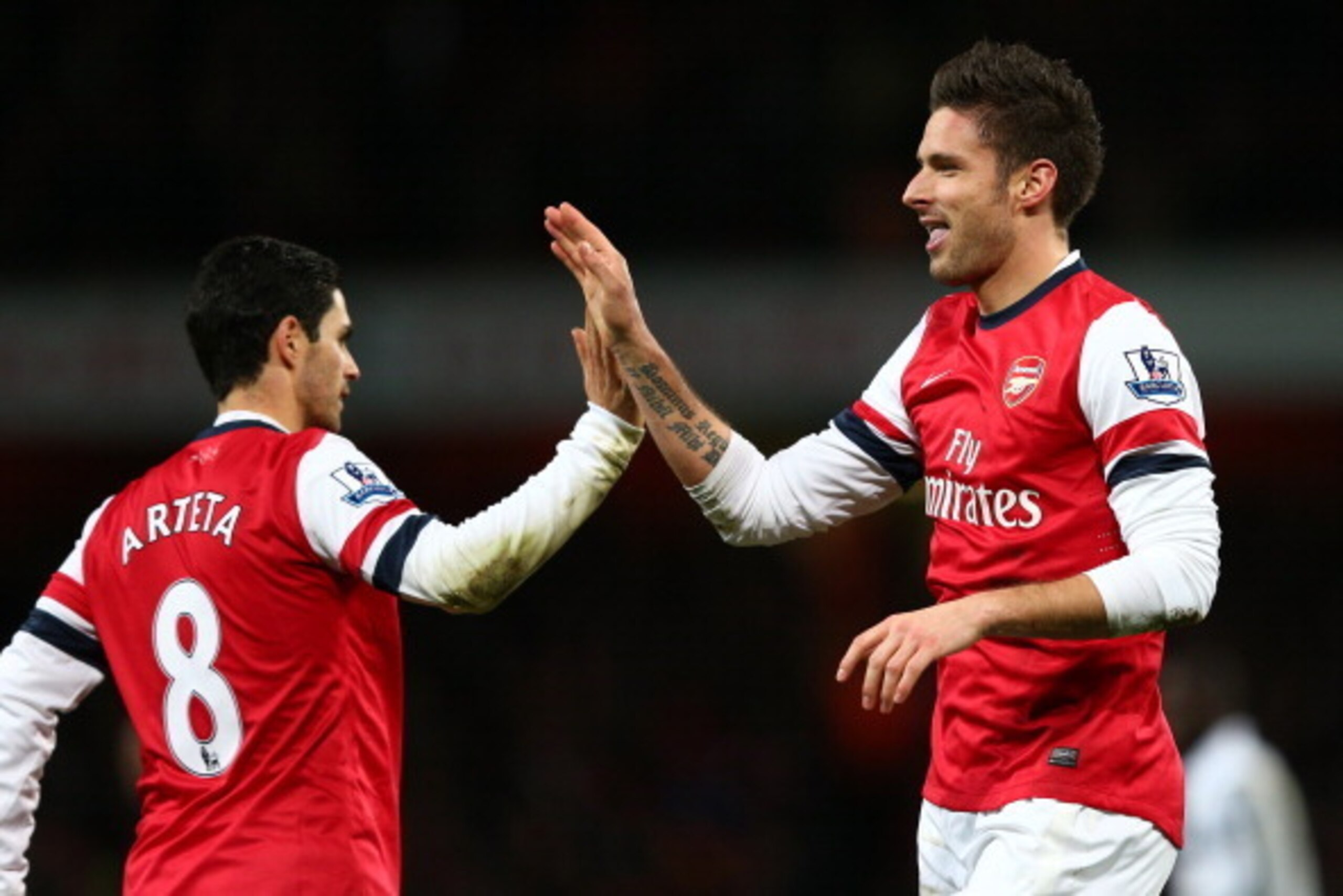 LONDON, ENGLAND - DECEMBER 29: Olivier Giroud of Arsenal celebrates scoring their fifth goal with Mikel Arteta of Arsenal during the Barclays Premier League match between Arsenal and Newcastle United at the Emirates Stadium on December 29, 2012 in London LONDON, ENGLAND - DECEMBER 29: Olivier Giroud of Arsenal celebrates scoring their fifth goal with Mikel Arteta of Arsenal during the Barclays Premier League match between Arsenal and Newcastle United at the Emirates Stadium on December 29, 2012 in London