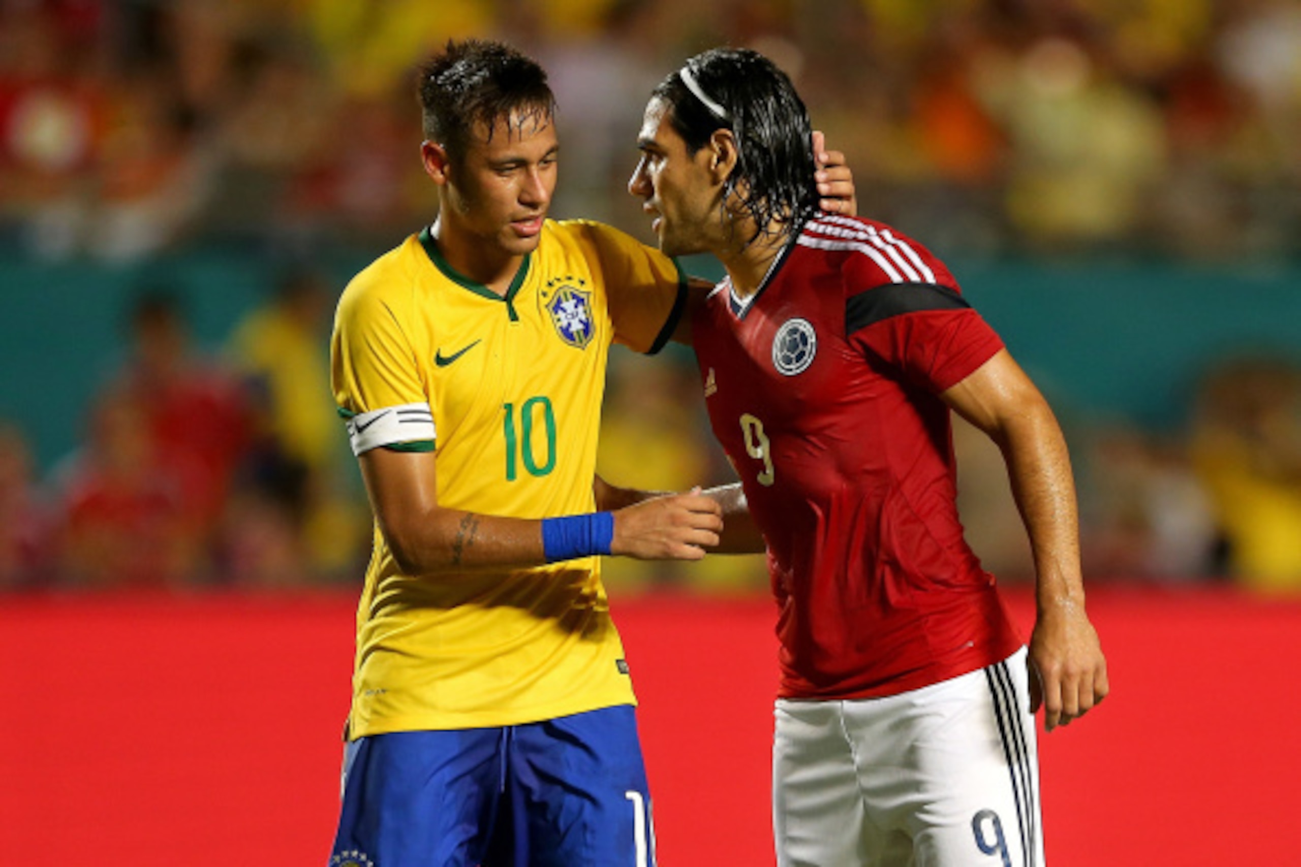 MIAMI GARDENS, FL - SEPTEMBER 05:  Falcao #9 of Colombia greets Neymar #10 of Brazil during an International Soccer friendly against Brazil at Sun Life Stadium on September 5, 2014 in Miami Gardens, Florida.  (Photo by Mike Ehrmann/Getty Images)