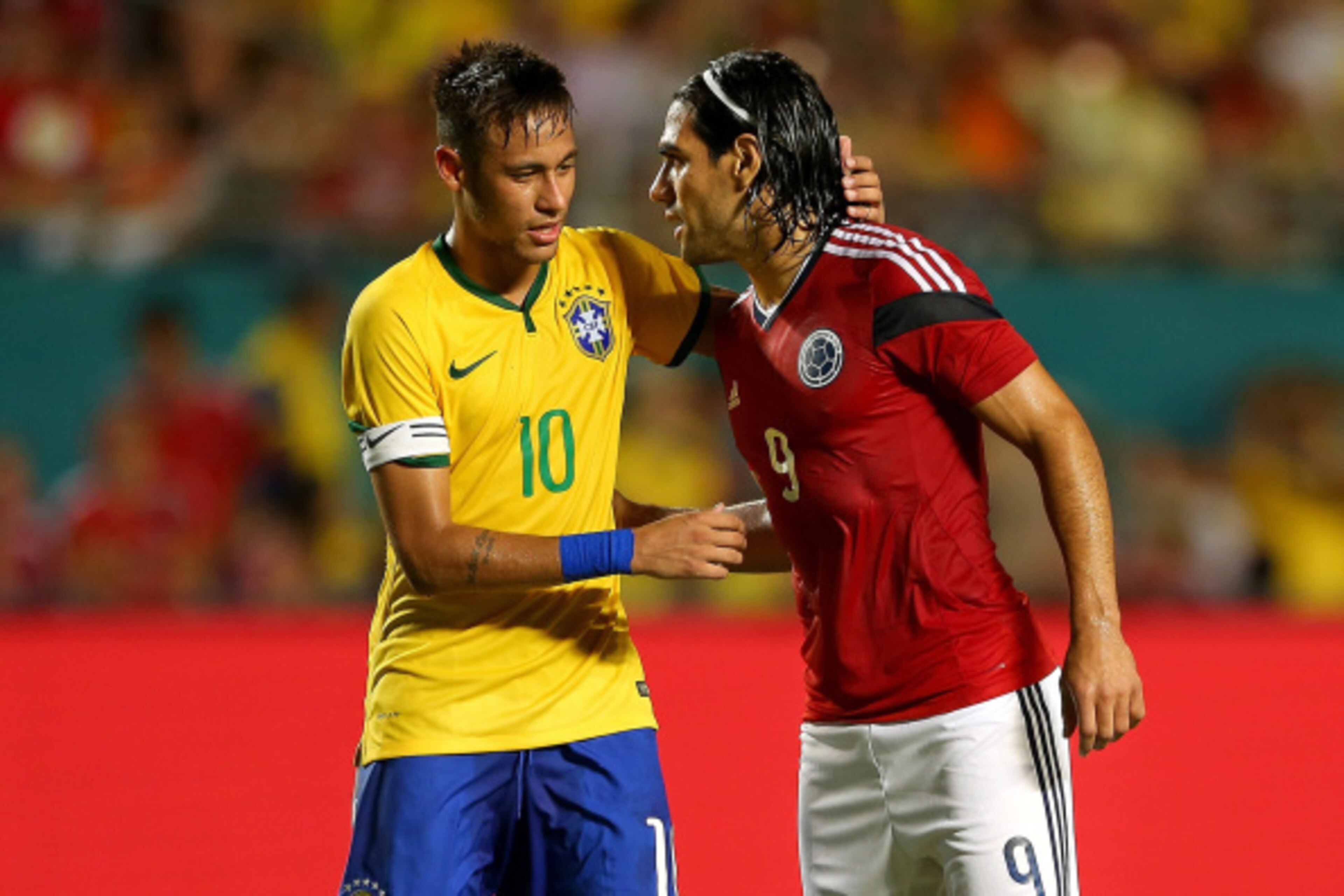 MIAMI GARDENS, FL - SEPTEMBER 05:  Falcao #9 of Colombia greets Neymar #10 of Brazil during an International Soccer friendly against Brazil at Sun Life Stadium on September 5, 2014 in Miami Gardens, Florida.  (Photo by Mike Ehrmann/Getty Images)