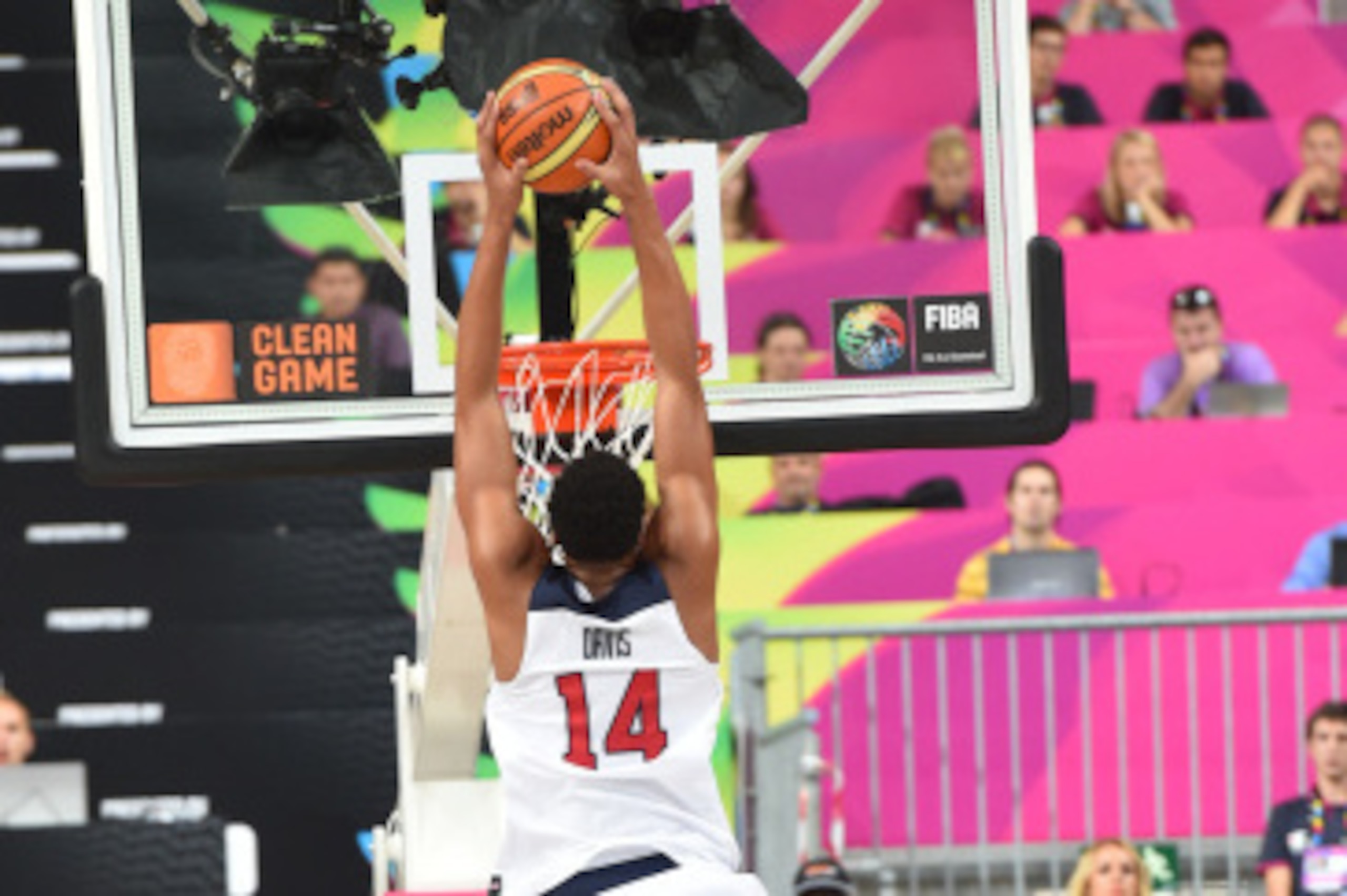 BARCELONA, SPAIN - SEPTEMBER 6: Anthony Davis #14 of the USA Basketball Men's National Team dunks against the Mexico National Team at Palau Sant Jordi on September 6, 2014 in Barcelona, Spain.  NOTE TO USER: User expressly acknowledges and agrees that, by