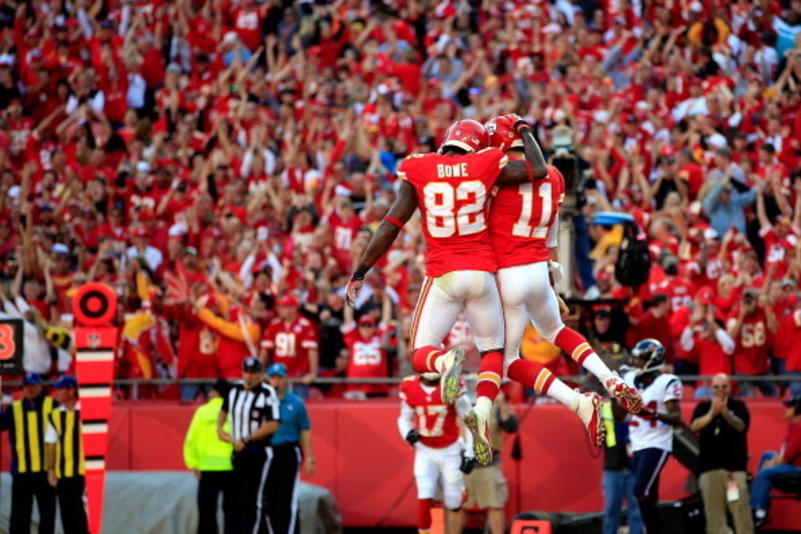KANSAS CITY, MO - OCTOBER 20:  Wide receiver Dwayne Bowe #82 of the Kansas City Chiefs congratulates quarterback Alex Smith #11 after Smith carried the ball into the endzone for a touchdown during the 1st half of the game against the Houston Texans at Arr