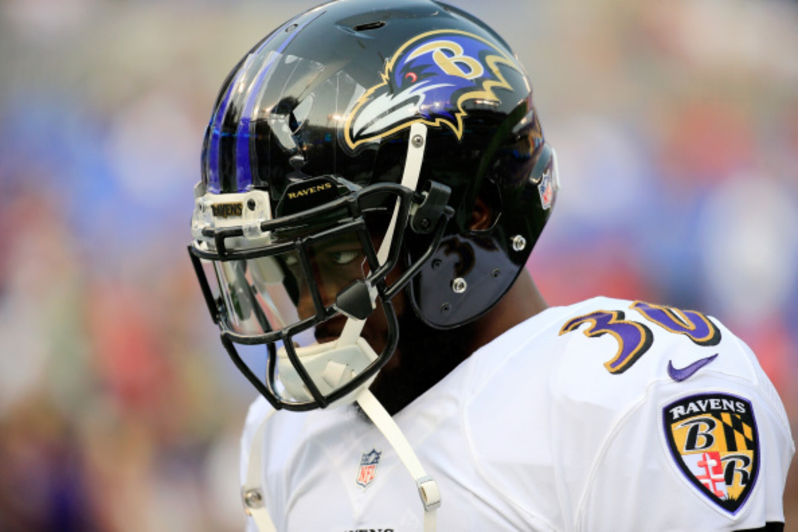 BALTIMORE, MD - AUGUST 07:  Running back Bernard Pierce #30 of the Baltimore Ravens warms up before the start of an NFL pre-season game against the San Francisco 49ers at M&T Bank Stadium on August 7, 2014 in Baltimore, Maryland.  (Photo by Rob Carr/Getty