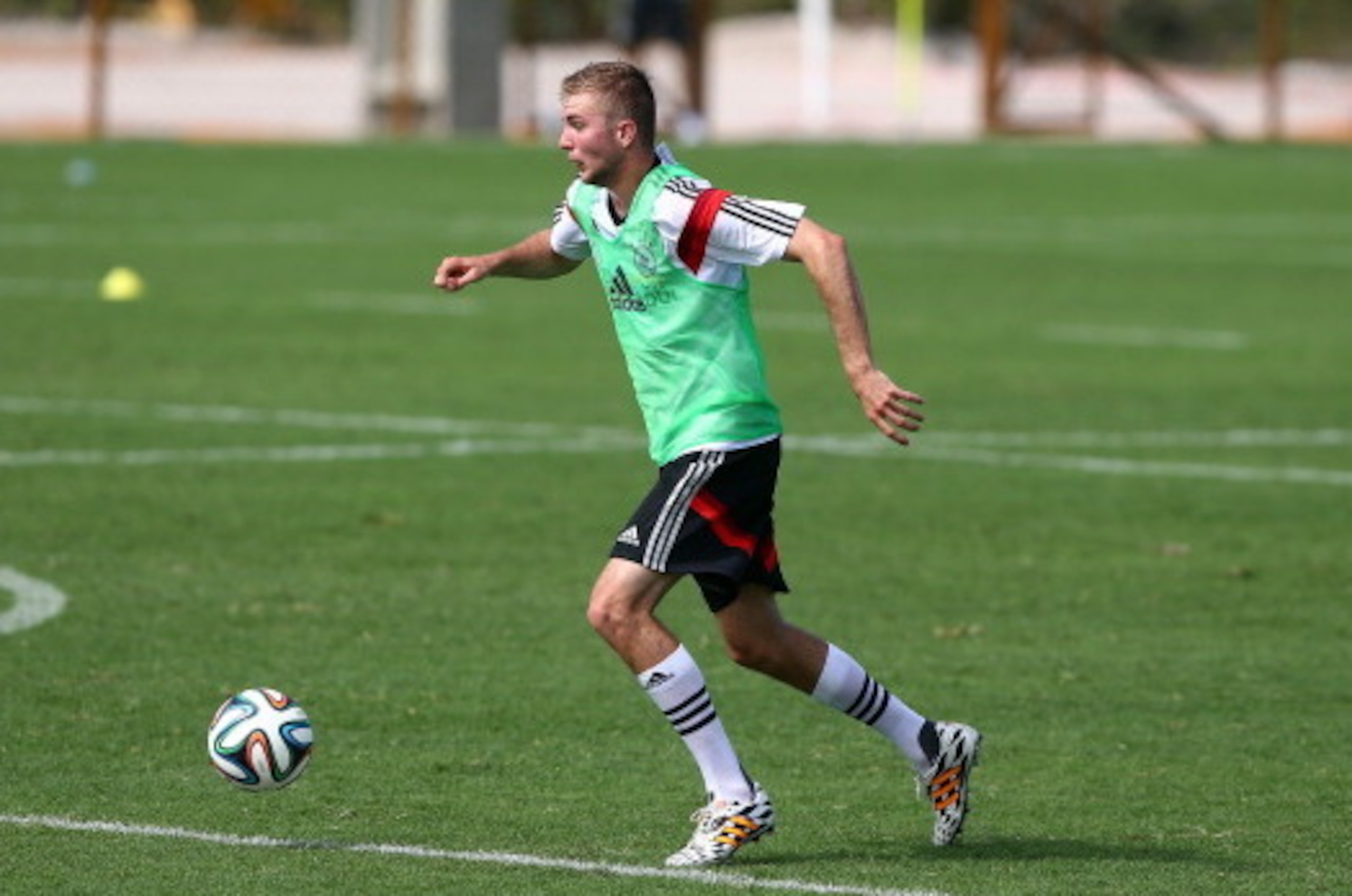 SANTO ANDRE, BRAZIL - JUNE 09: Christoph Kramer runs with the ball during the German National team training session at  Campo Bahia on June 9, 2014 in Santo Andre, Brazil.  (Photo by Martin Rose/Getty Images)