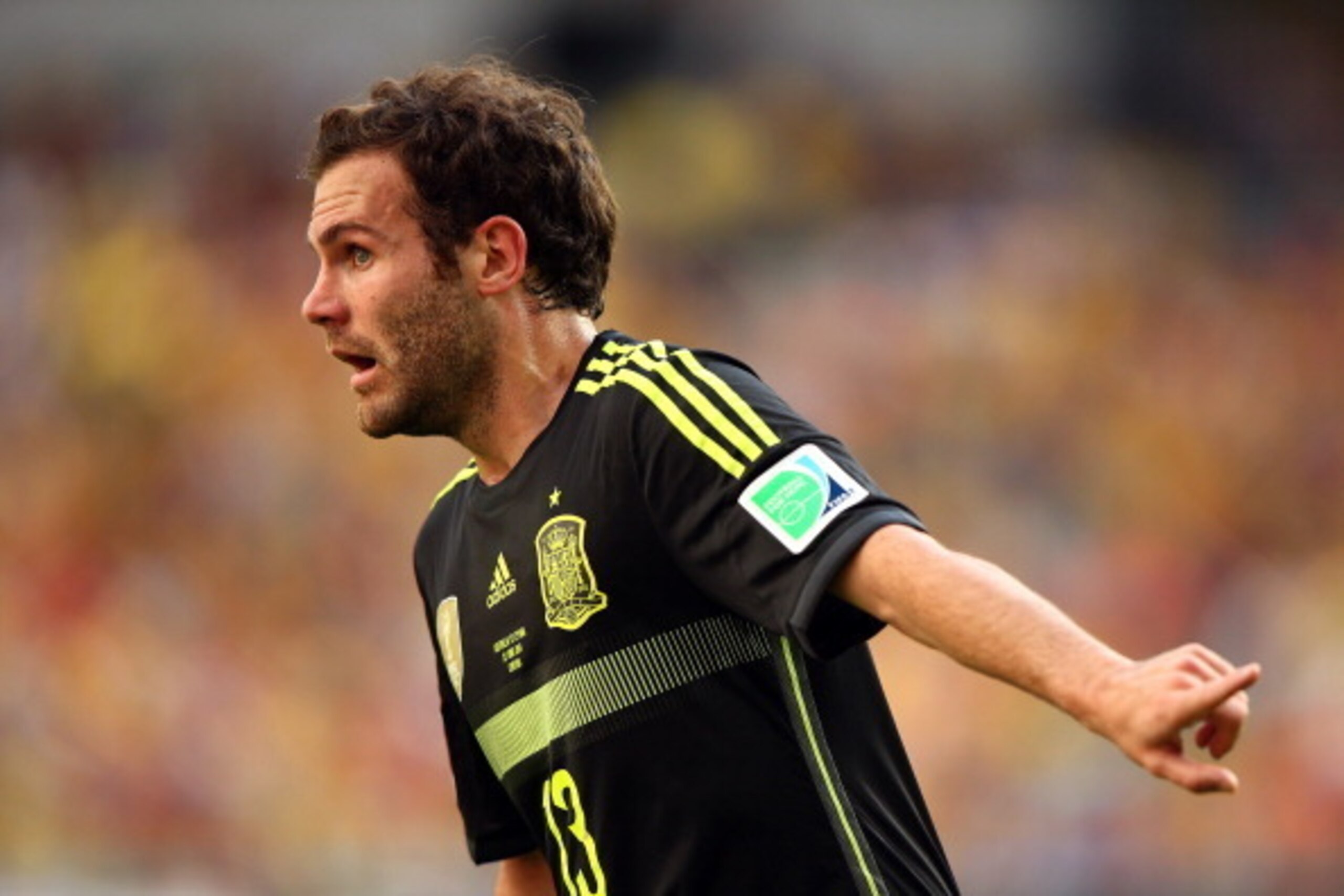CURITIBA, BRAZIL - JUNE 23: Juan Mata of Spain reacts during the 2014 FIFA World Cup Brazil Group B match between Australia and Spain at Arena da Baixada on June 23, 2014 in Curitiba, Brazil.  (Photo by Ian Walton/Getty Images)