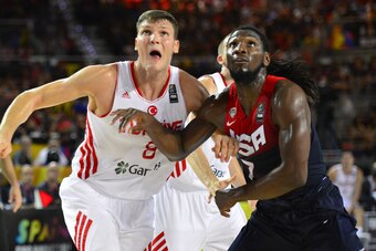 BILBAO, SPAIN - AUGUST 31: Kenneth Faried #7 of the USA Basketball Men's National Team battles for a rebound against Baris Hersek #8 of the Turkey Basketball Men's National Team during the 2014 FIBA World Cup at Bizkaia Arena in Bilbao Exhibition Centre o
