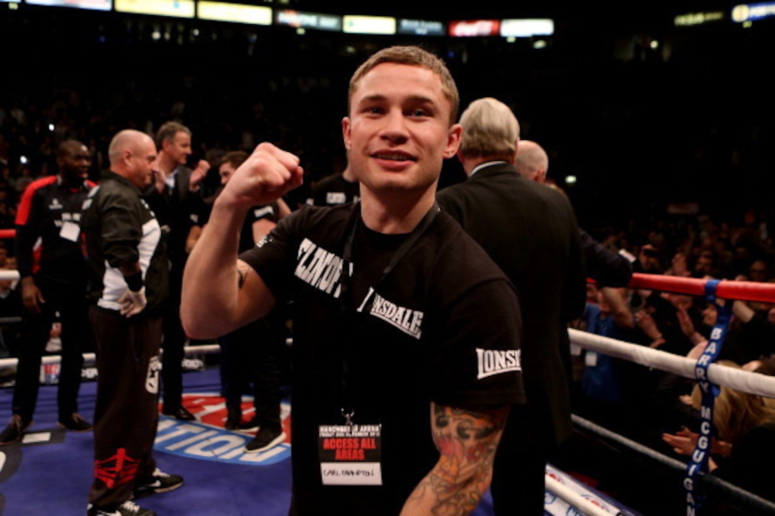 MANCHESTER, ENGLAND - NOVEMBER 30:  Carl Frampton celebrates after Andrew Flintoff's victory over Richard Dawson during their International Heavyweight bout at MEN Arena on November 30, 2012 in Manchester, England.  (Photo by Scott Heavey/Getty Images)