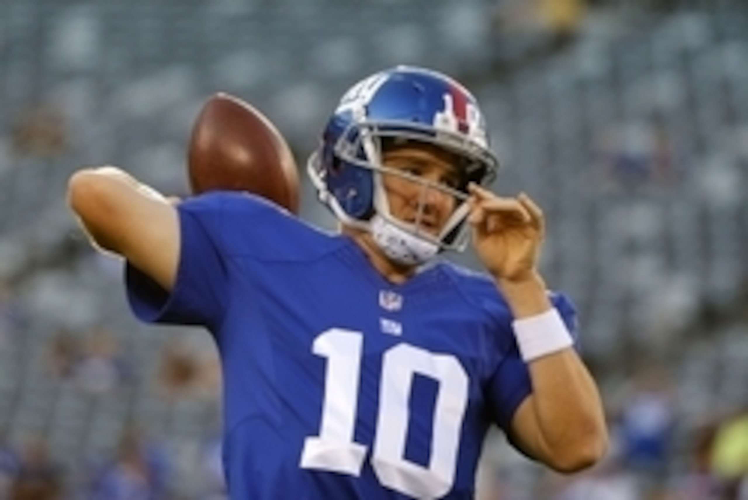 Aug 28, 2014; East Rutherford, NJ, USA;  New York Giants quarterback Eli Manning (10) warming up prior to the game against the New England Patriots at MetLife Stadium. Mandatory Credit: Jim O'Connor-USA TODAY Sports