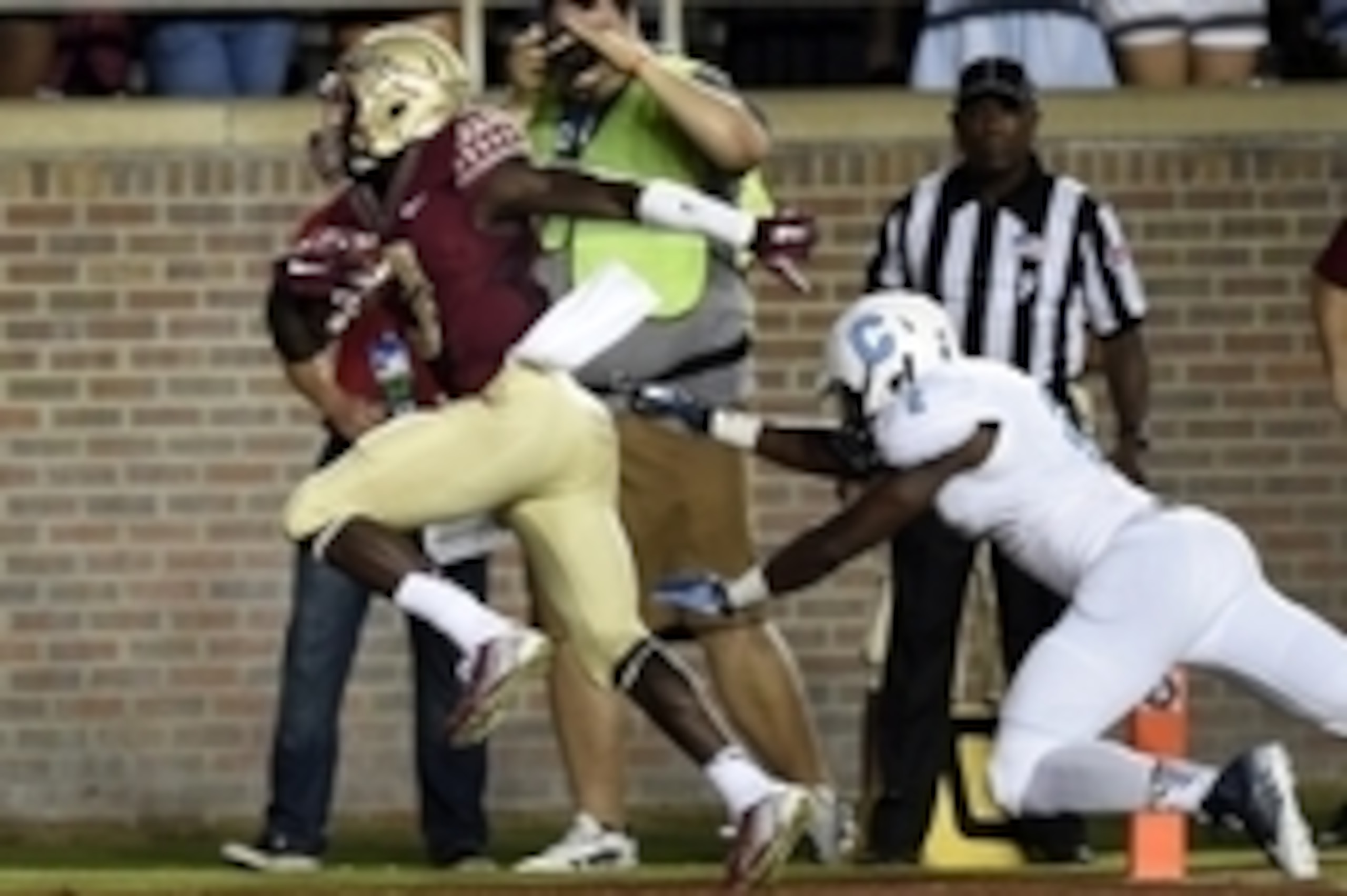 Sep 6, 2014; Tallahassee, FL, USA; Florida State Seminoles wide receiver Jesus Wilson (3) scores a touchdown past Citadel Bulldogs defensive back Cody Richardson (2) during the first quarter at Doak Campbell Stadium. Mandatory Credit: John David Mercer-U Sep 6, 2014; Tallahassee, FL, USA; Florida State Seminoles wide receiver Jesus Wilson (3) scores a touchdown past Citadel Bulldogs defensive back Cody Richardson (2) during the first quarter at Doak Campbell Stadium. Mandatory Credit: John David Mercer-U